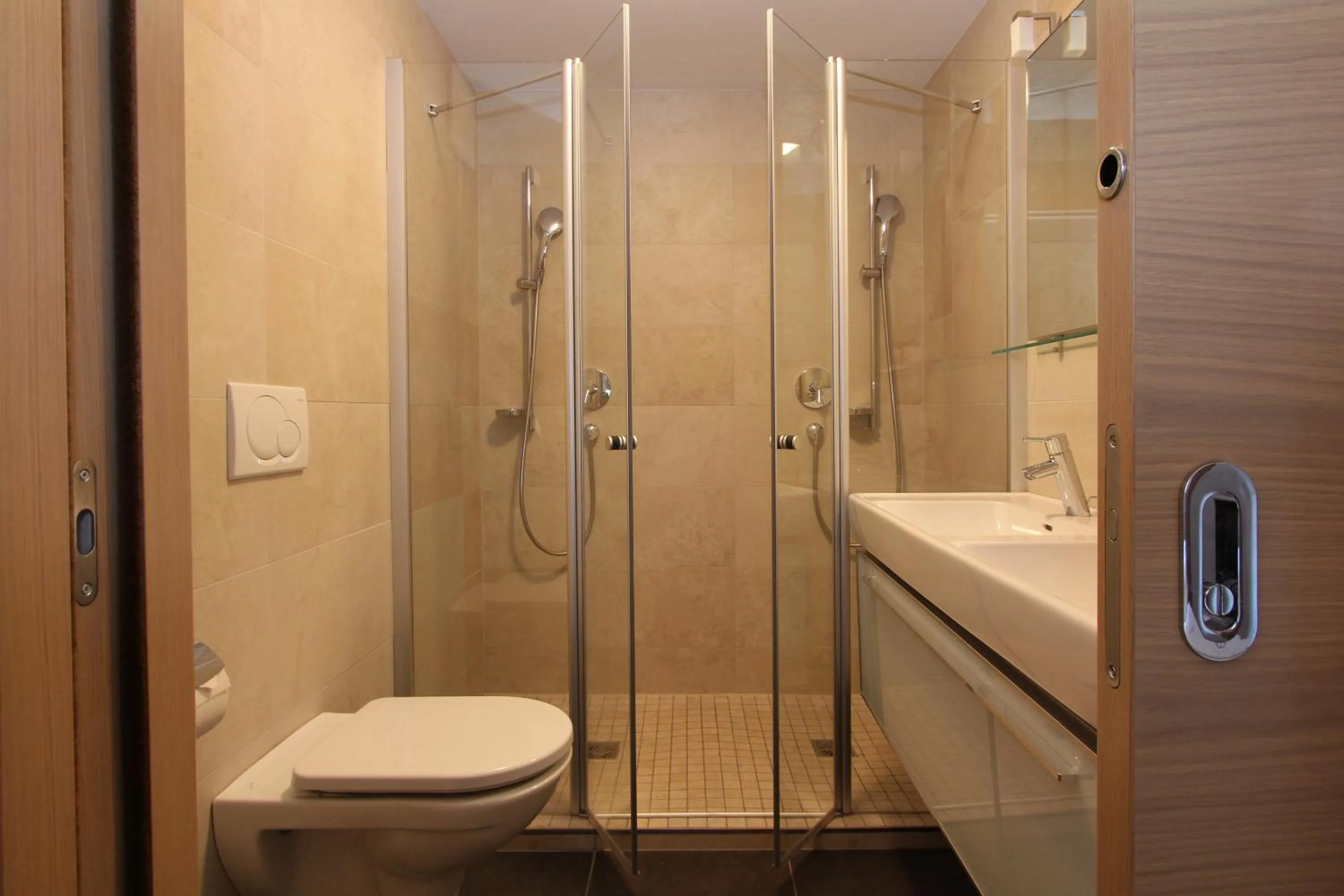 Shower in AvenidA Mountain Resort by Alpin Rentals