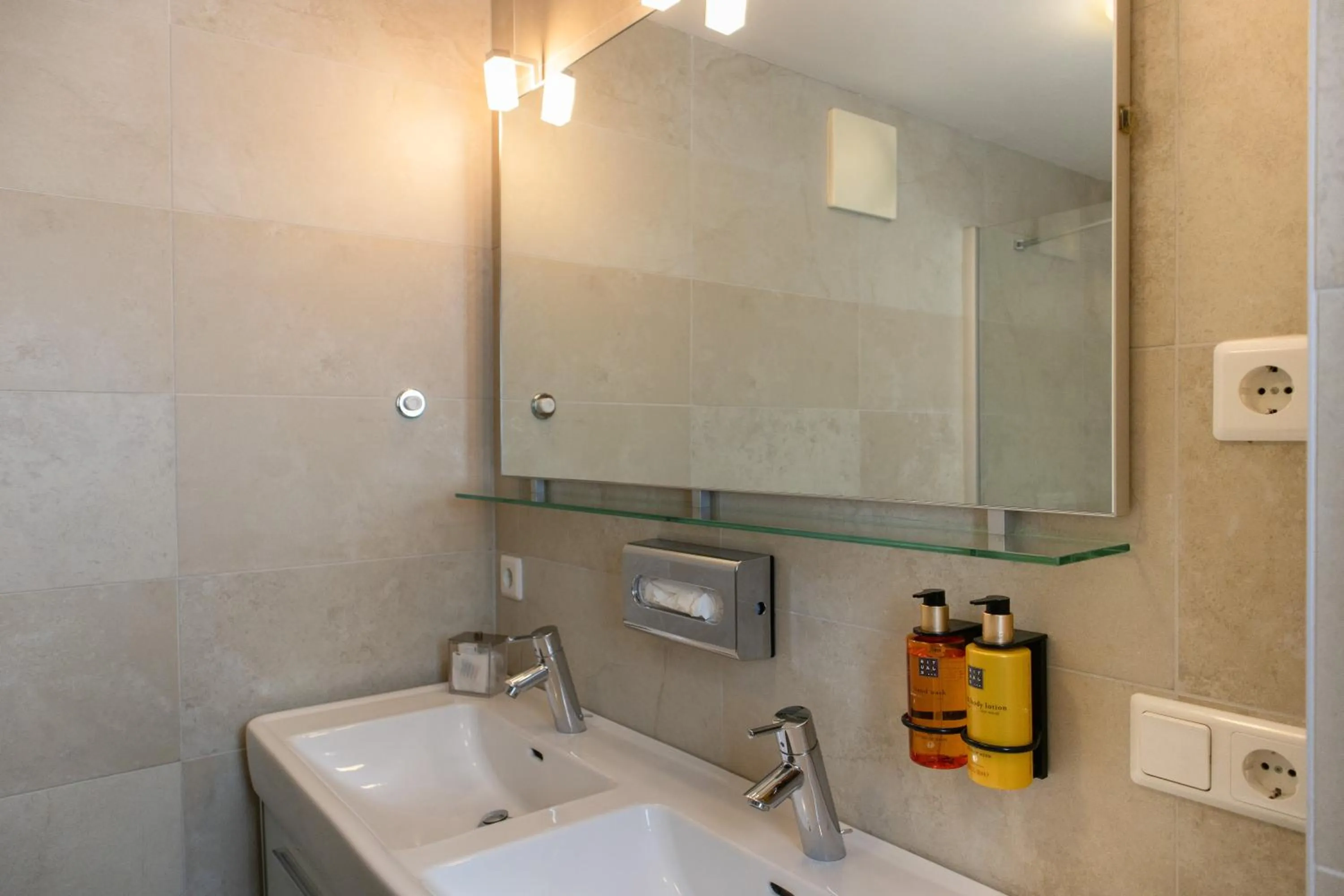 Bathroom in AvenidA Mountain Resort by Alpin Rentals