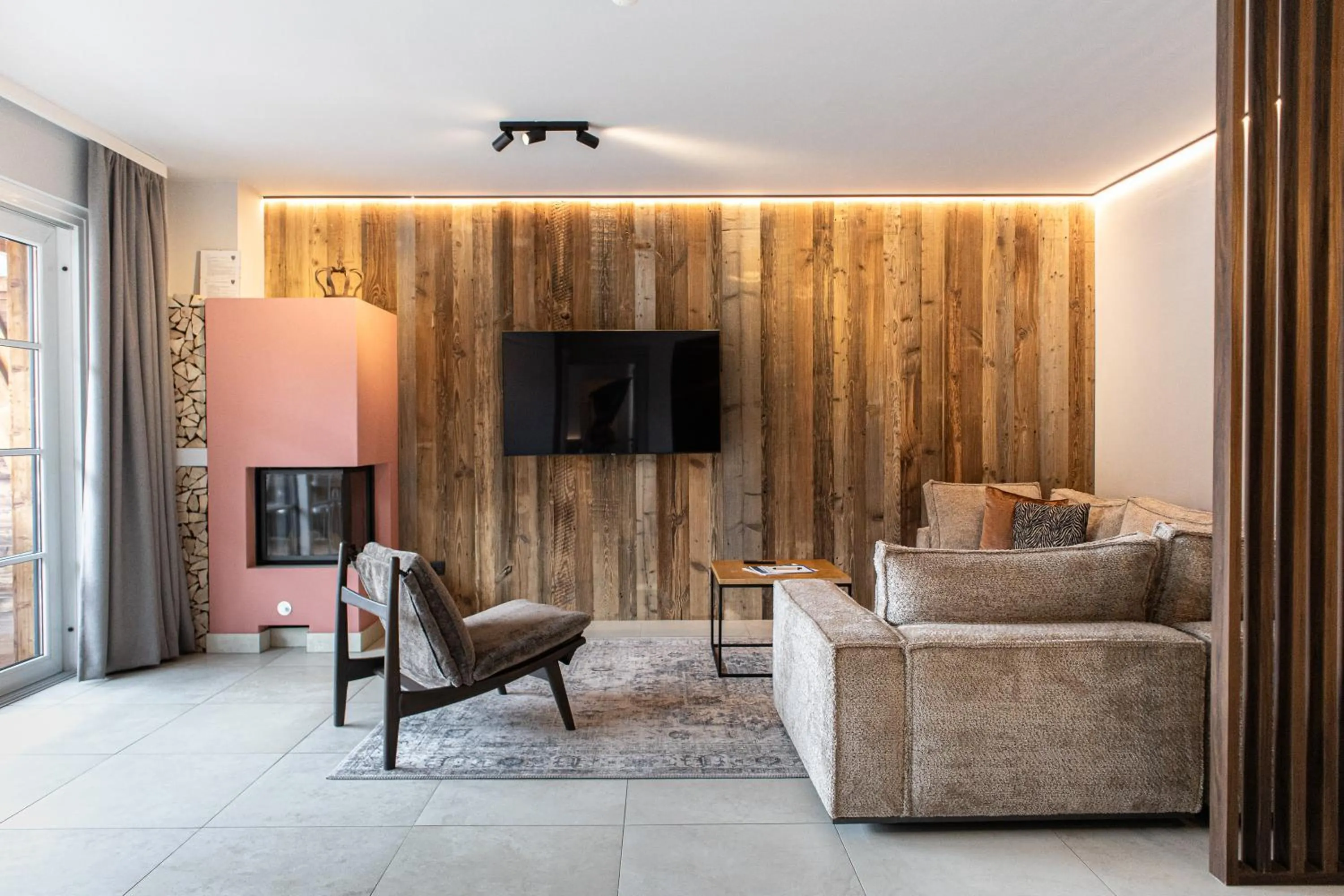 Living room in AvenidA Mountain Resort by Alpin Rentals