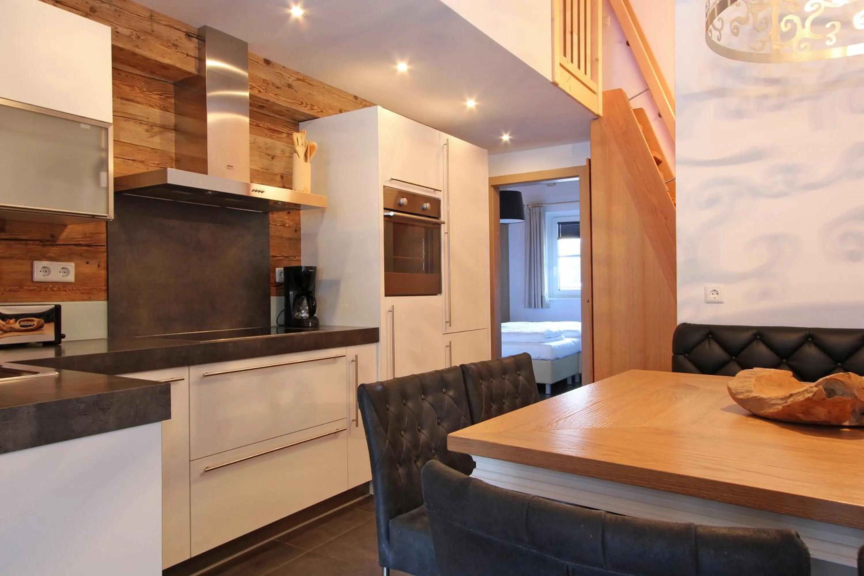 Dining area in AvenidA Mountain Resort by Alpin Rentals