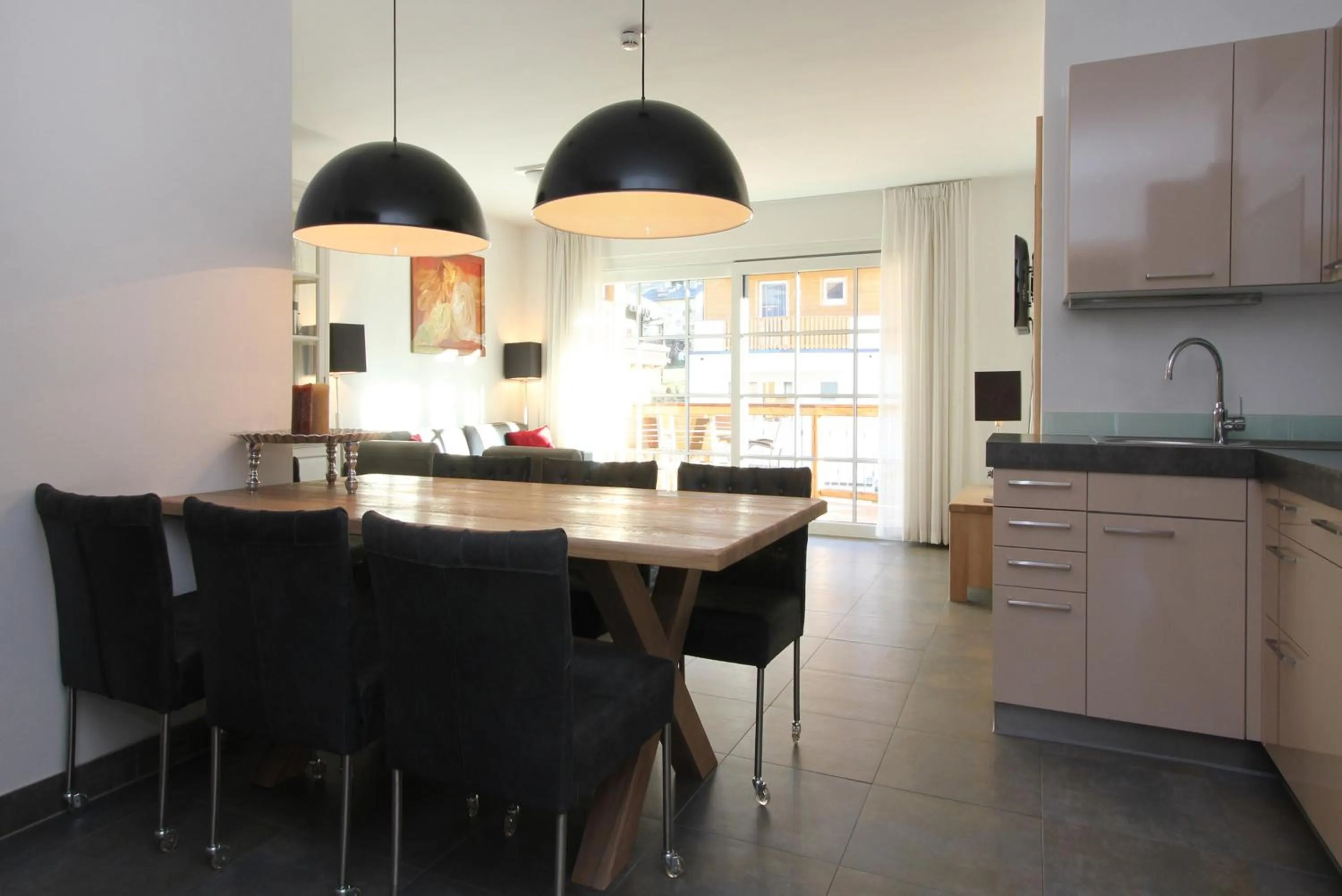 TV and multimedia in AvenidA Mountain Resort by Alpin Rentals