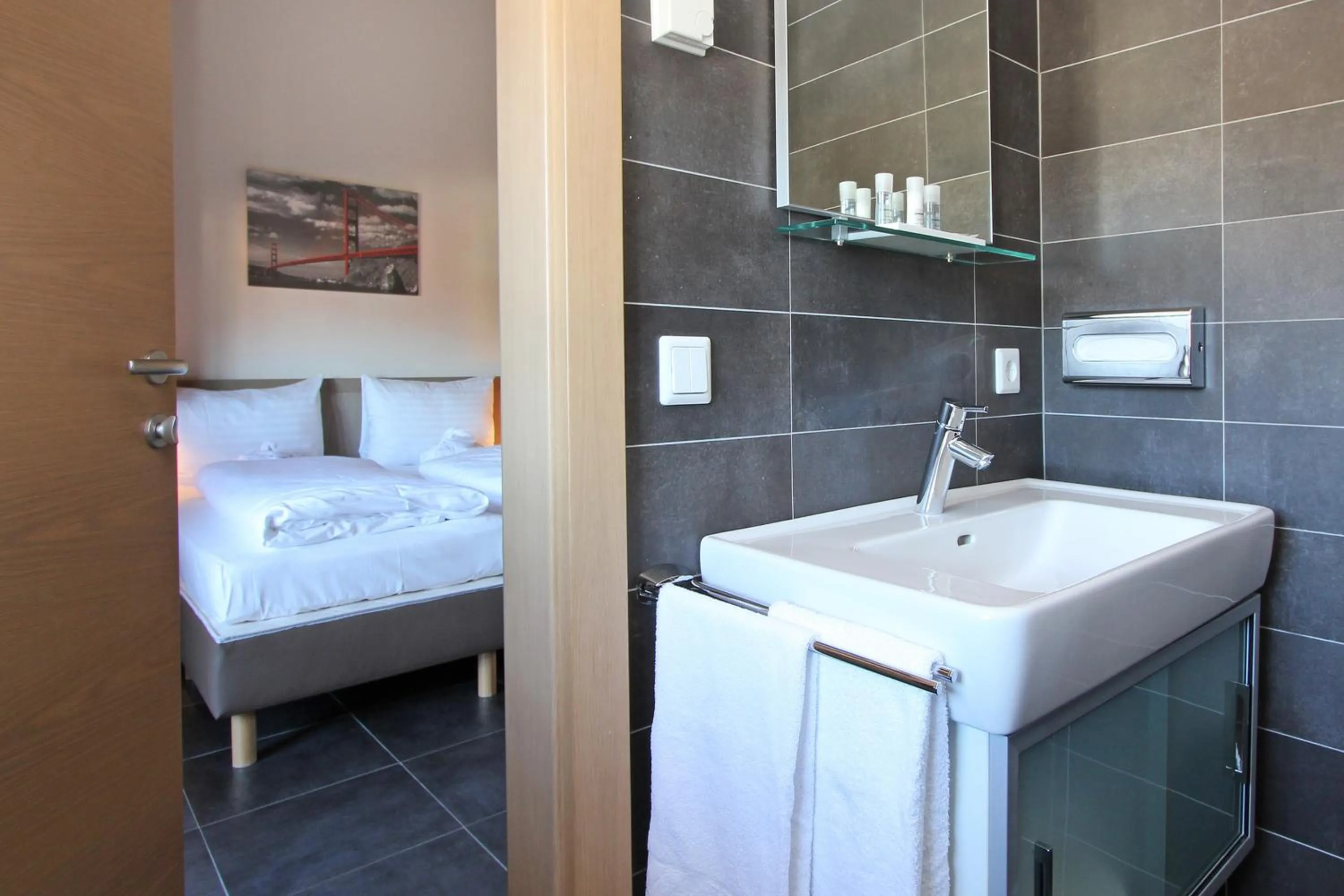 Bathroom, Bed in AvenidA Mountain Resort by Alpin Rentals