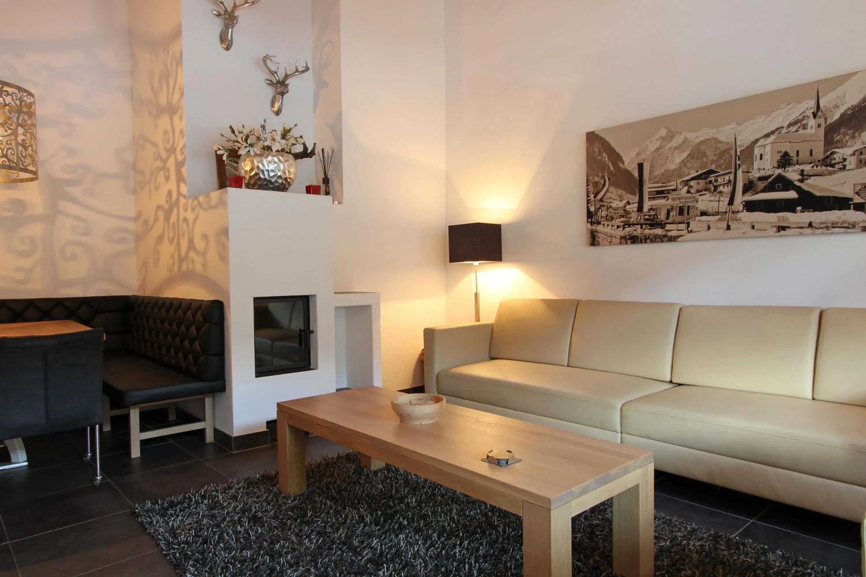 Living room in AvenidA Mountain Resort by Alpin Rentals