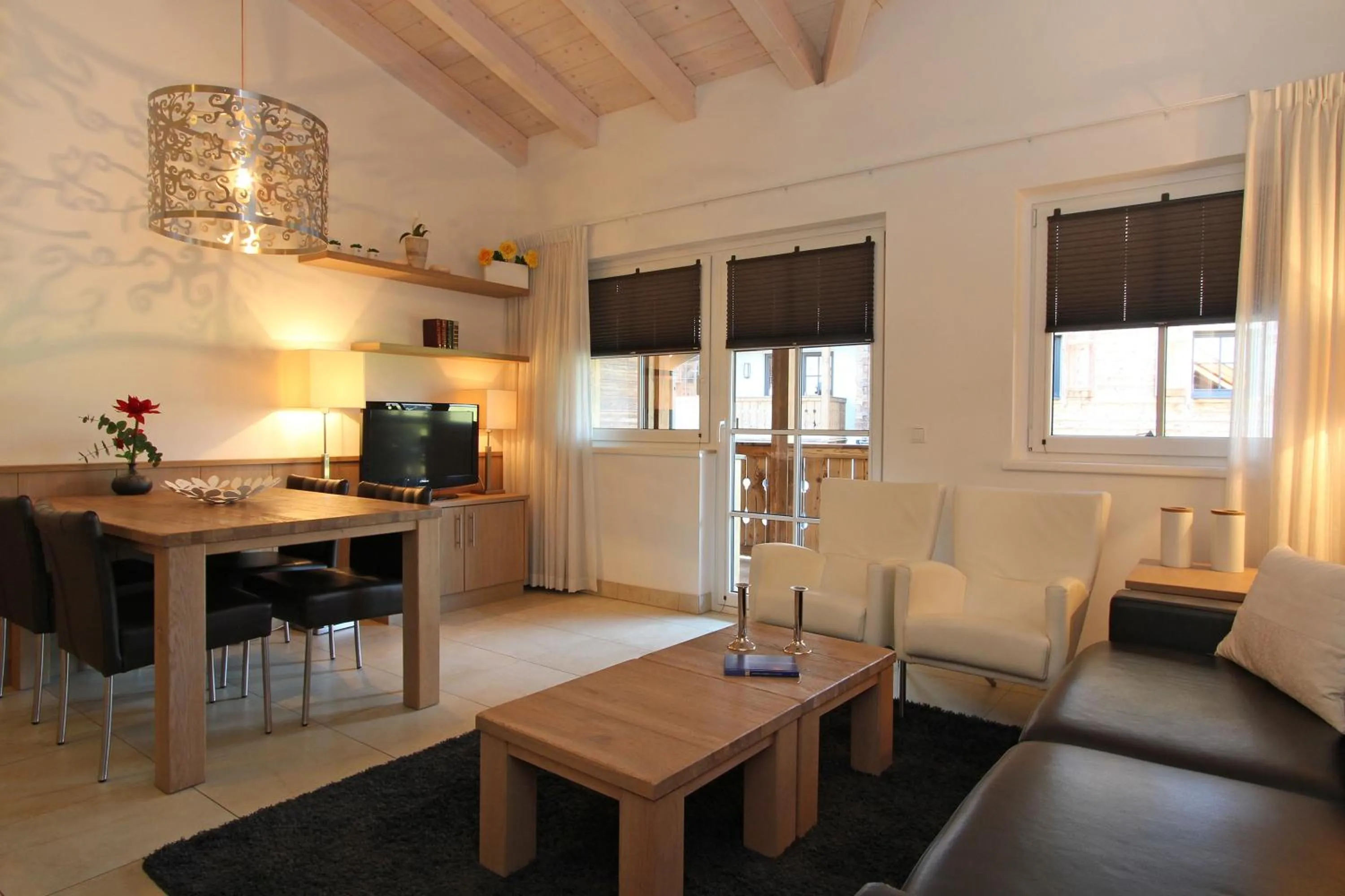 Living room in AvenidA Mountain Resort by Alpin Rentals