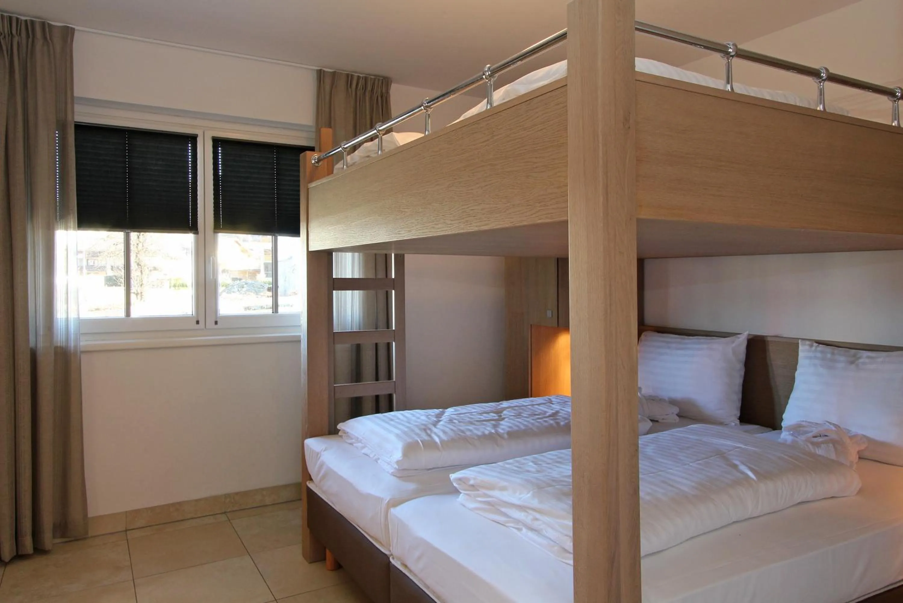 Bedroom, Bed in AvenidA Mountain Resort by Alpin Rentals