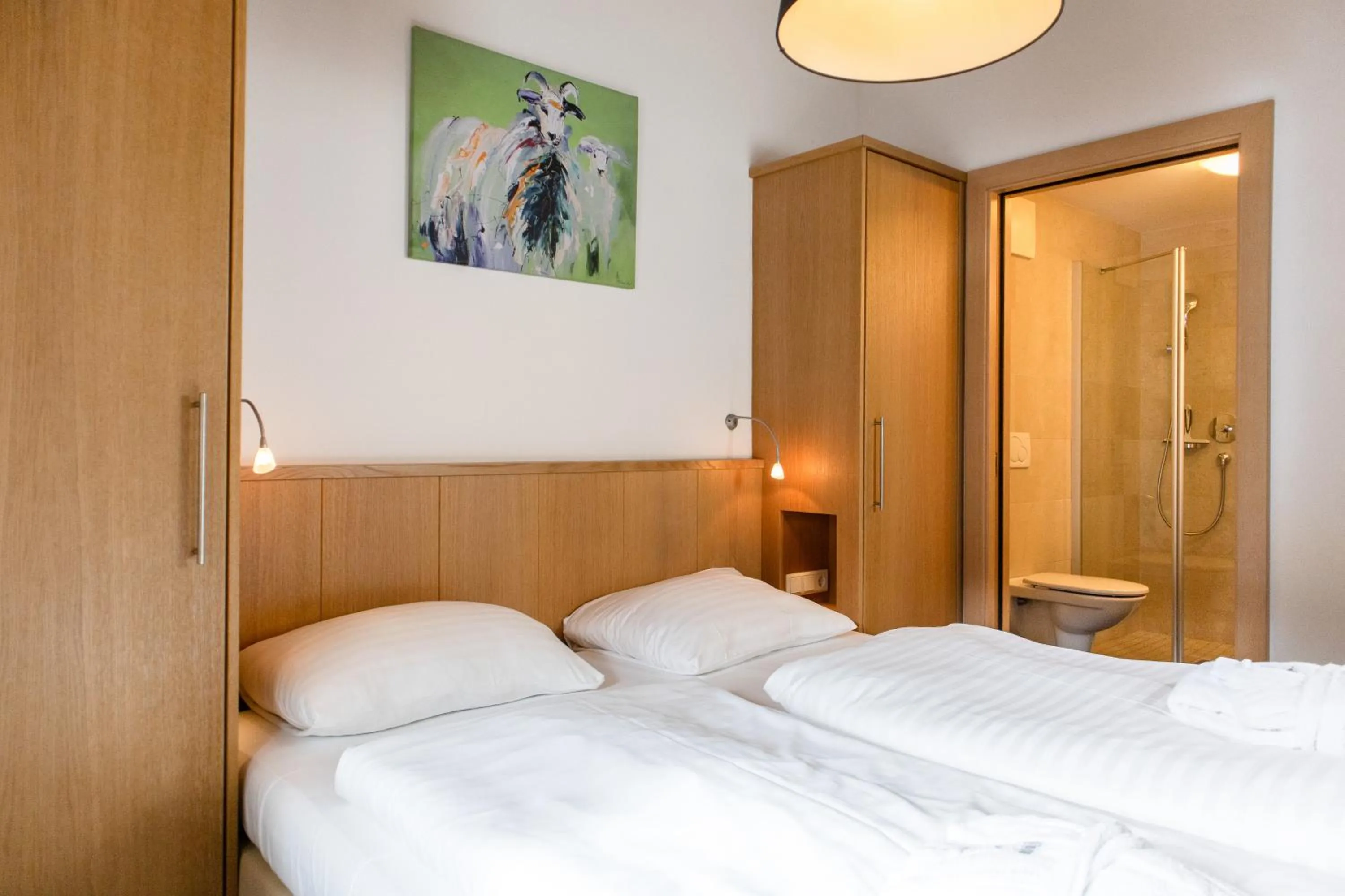 Bedroom, Bed in AvenidA Mountain Resort by Alpin Rentals
