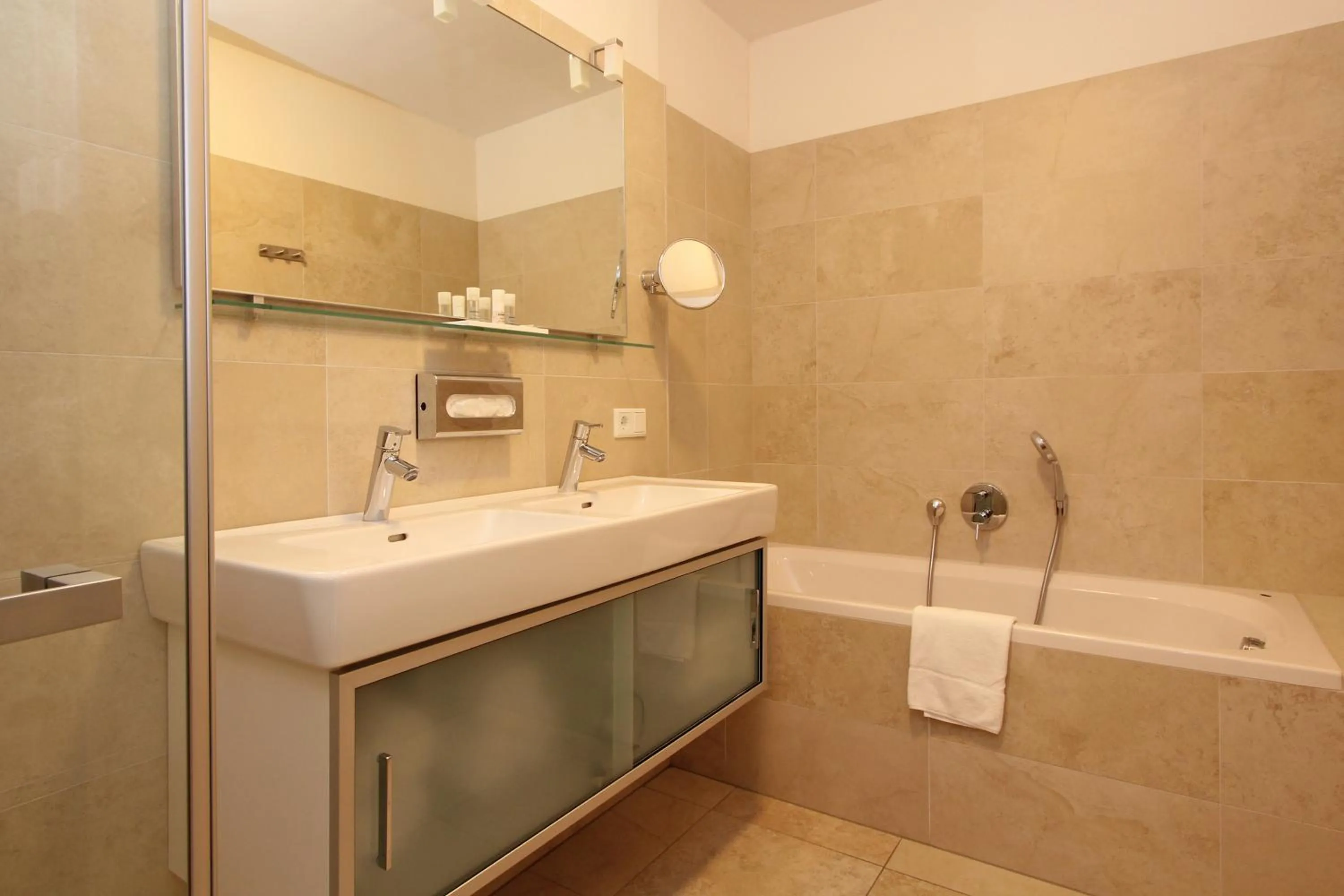 Shower in AvenidA Mountain Resort by Alpin Rentals