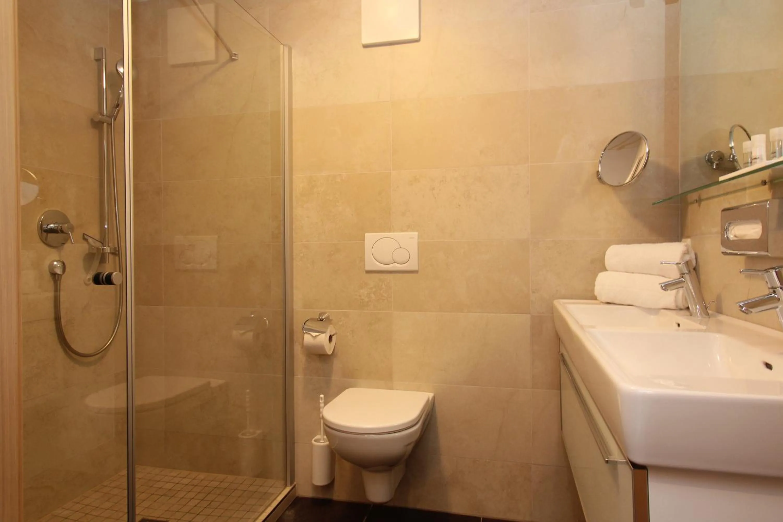 Shower in AvenidA Mountain Resort by Alpin Rentals