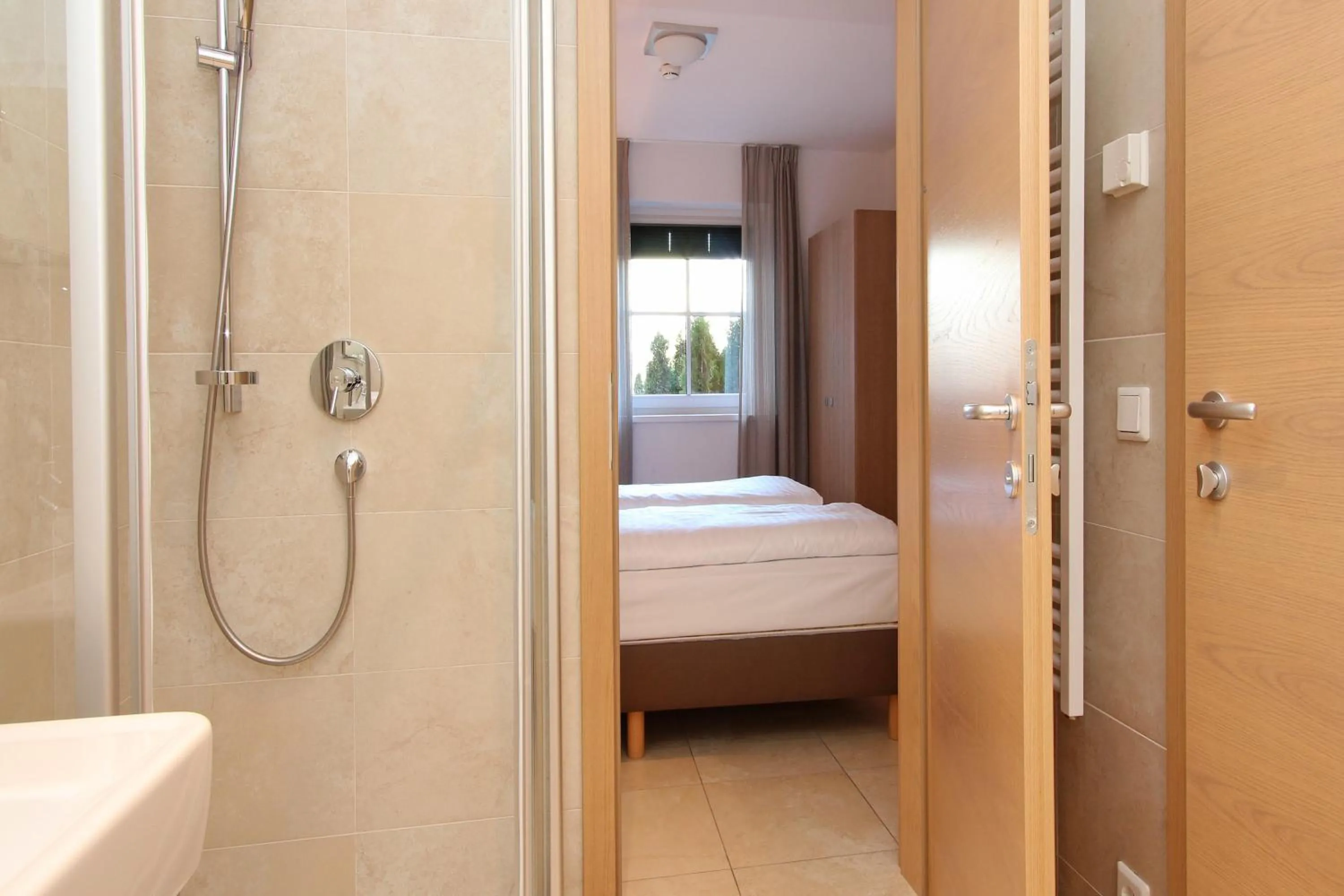Bathroom, Bed in AvenidA Mountain Resort by Alpin Rentals