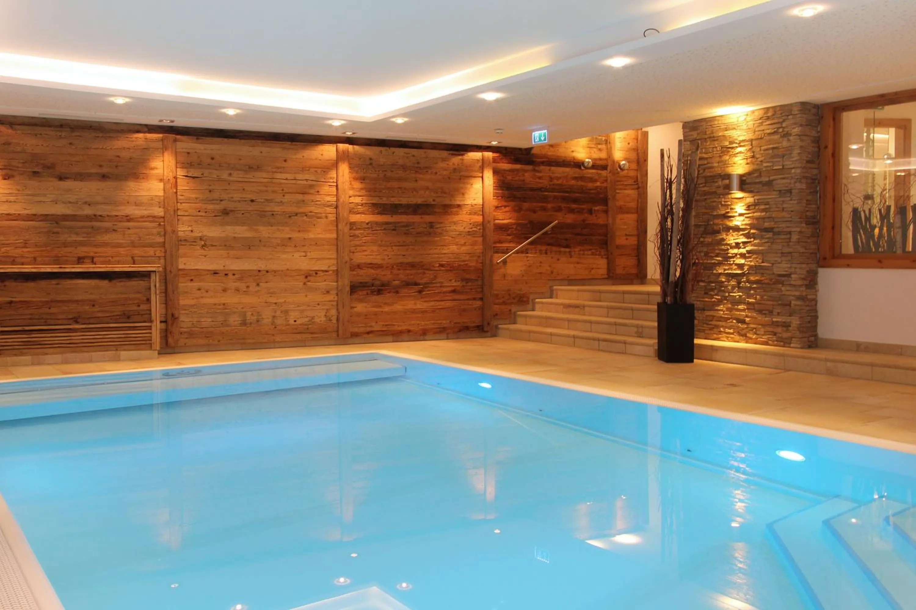 Swimming pool in AvenidA Mountain Resort by Alpin Rentals