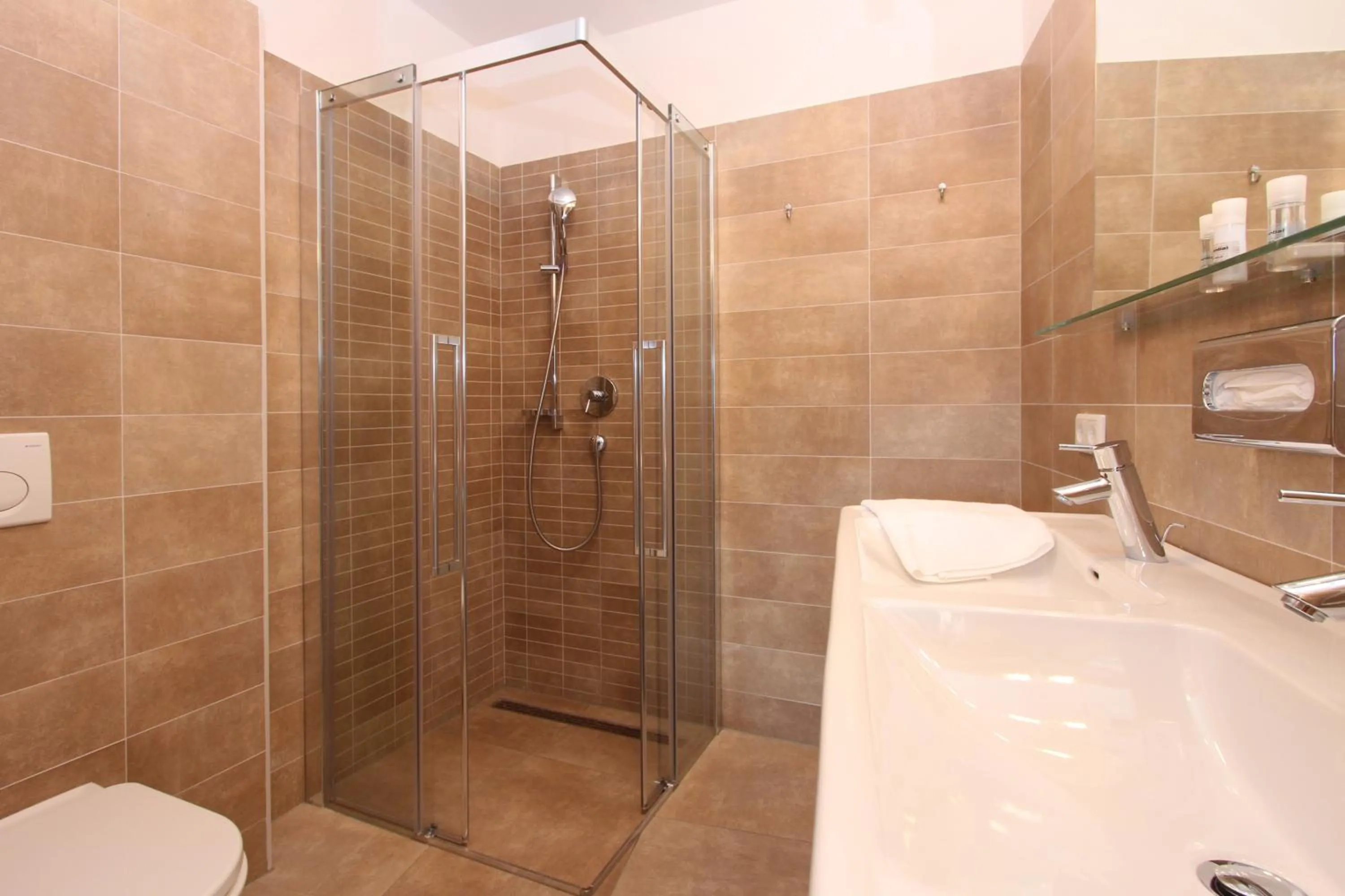 Shower in AvenidA Mountain Resort by Alpin Rentals