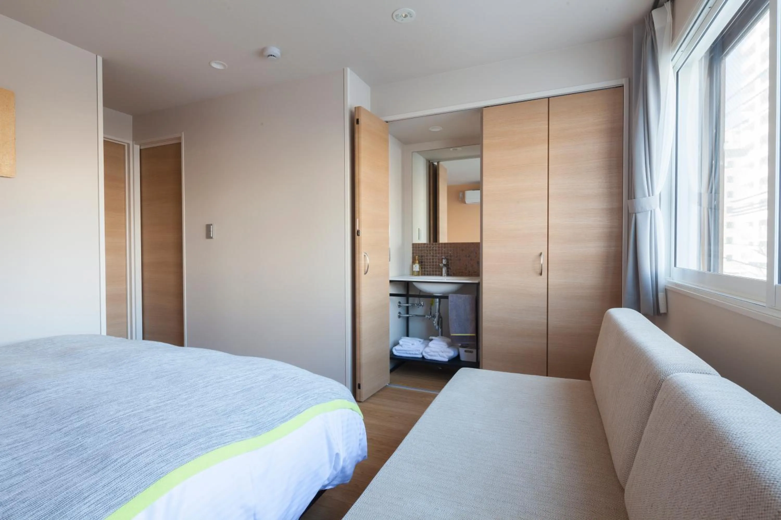 Bedroom, Bed in Private house Kuranoya Sapporo