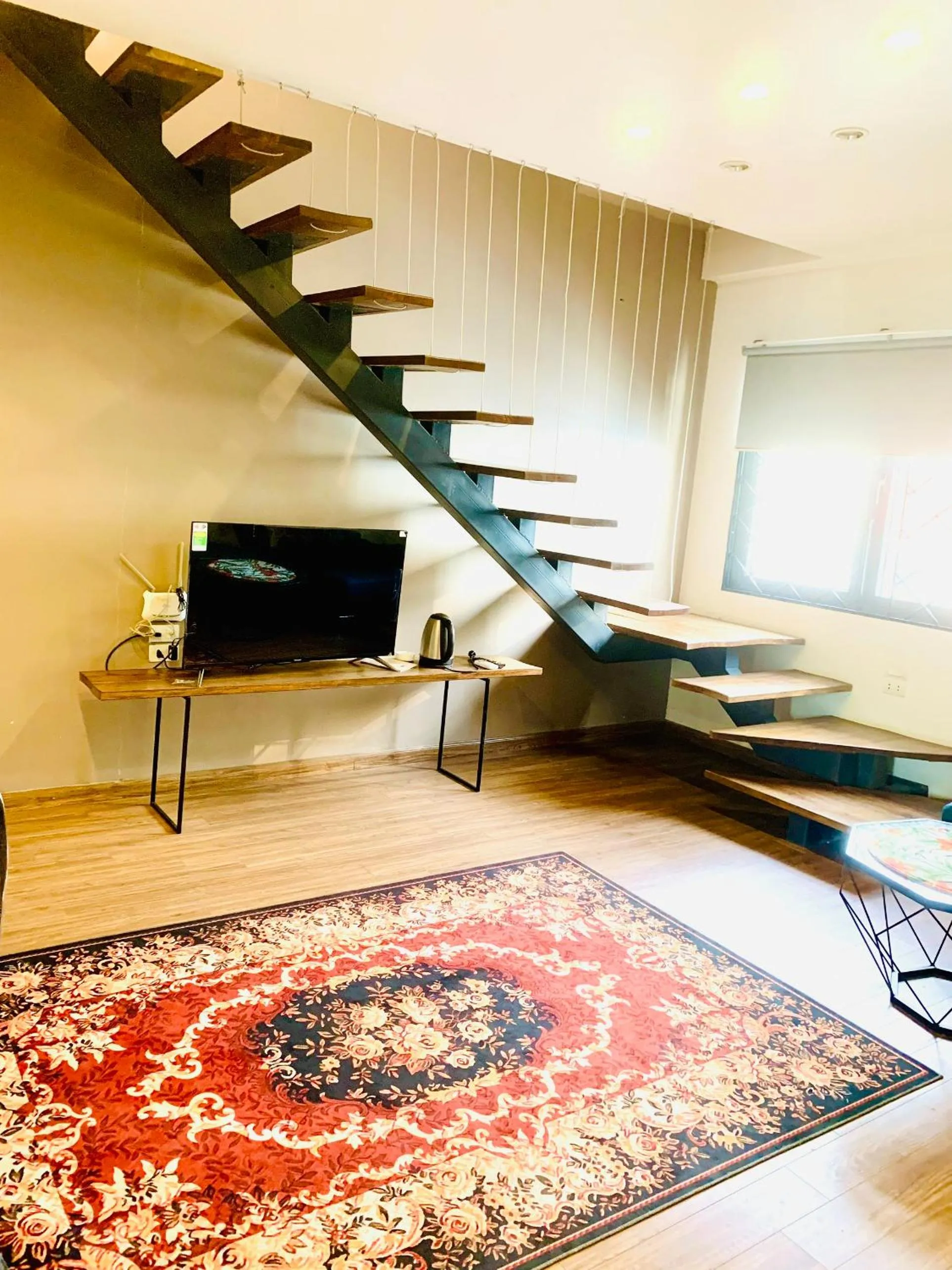 Living room in Unique Serviced Apartment