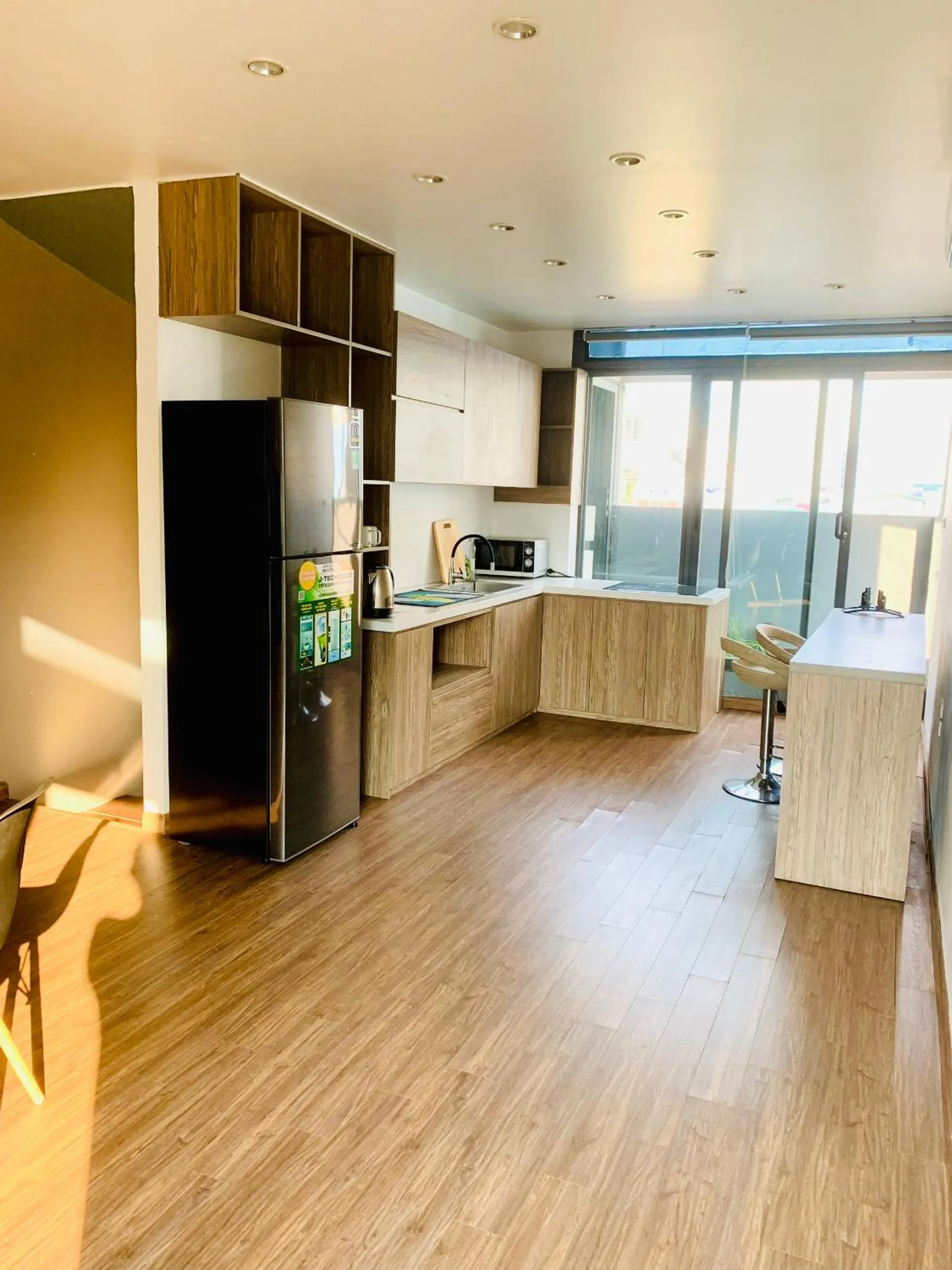 Kitchen or kitchenette in Unique Serviced Apartment