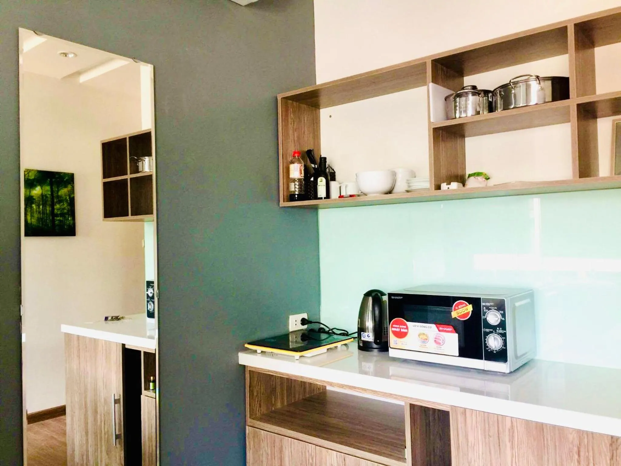 Kitchen or kitchenette in Unique Serviced Apartment
