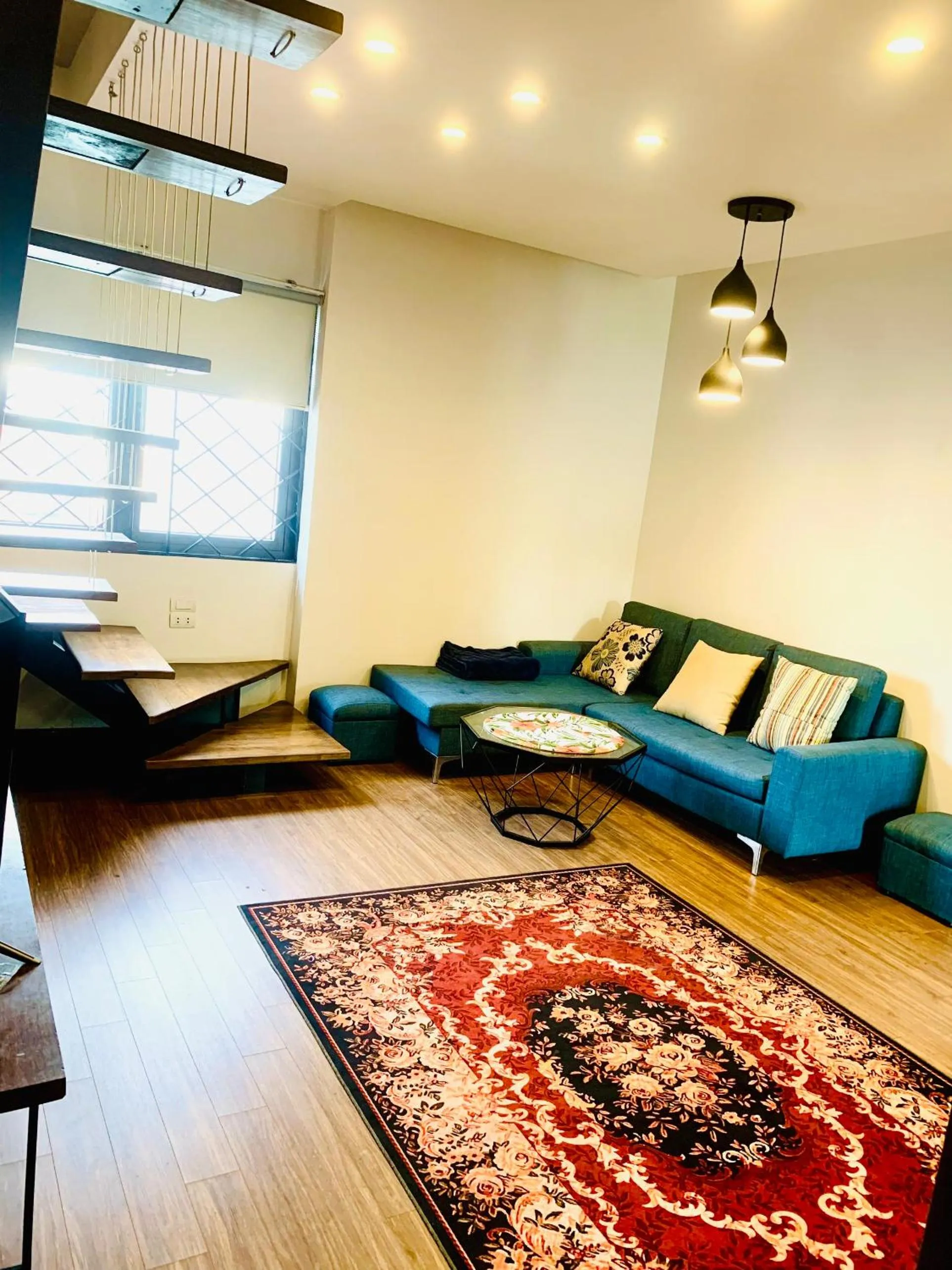 Living room in Unique Serviced Apartment