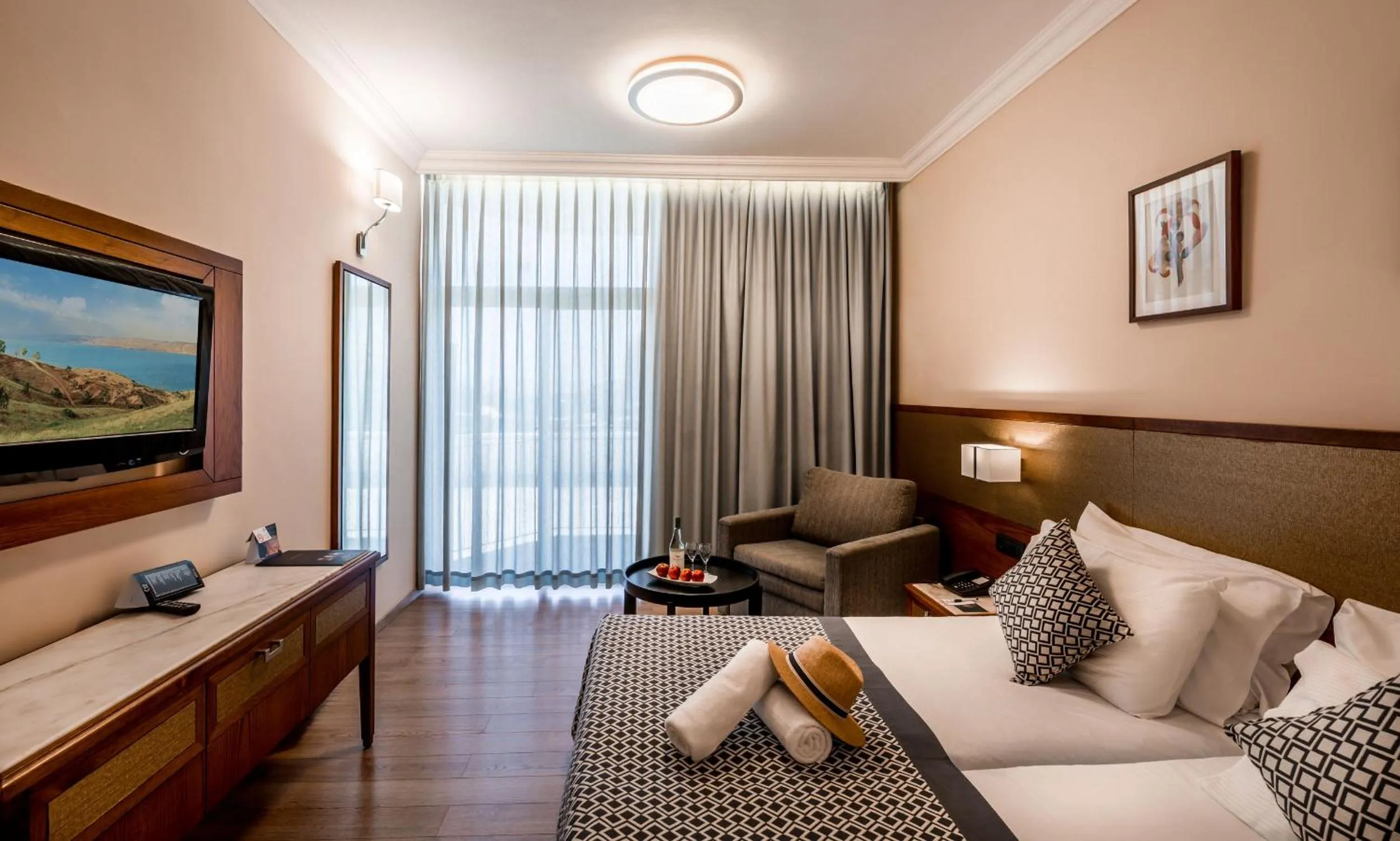 Bed in Caesar Premier Tiberias Hotel