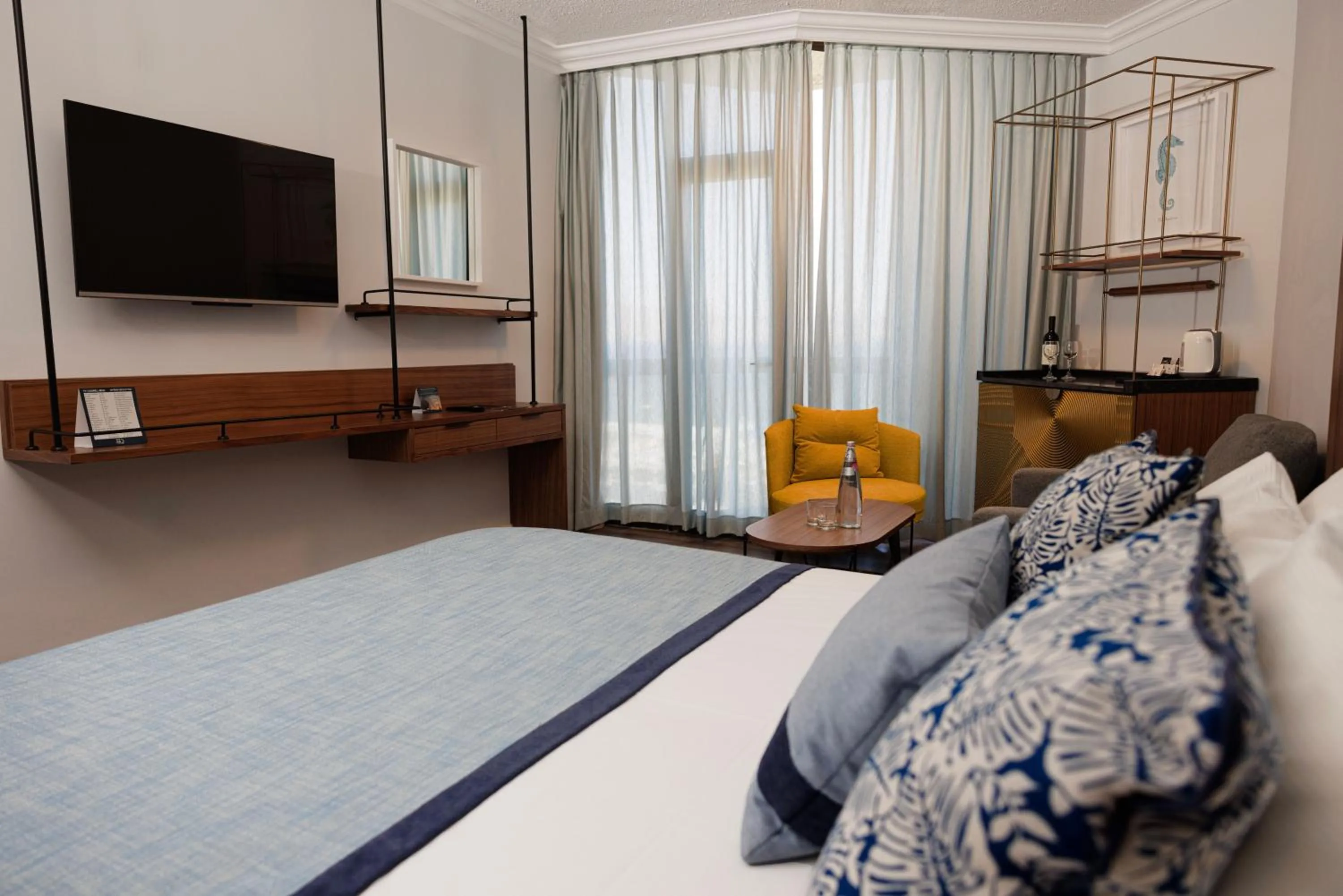 Bed in Caesar Premier Tiberias Hotel