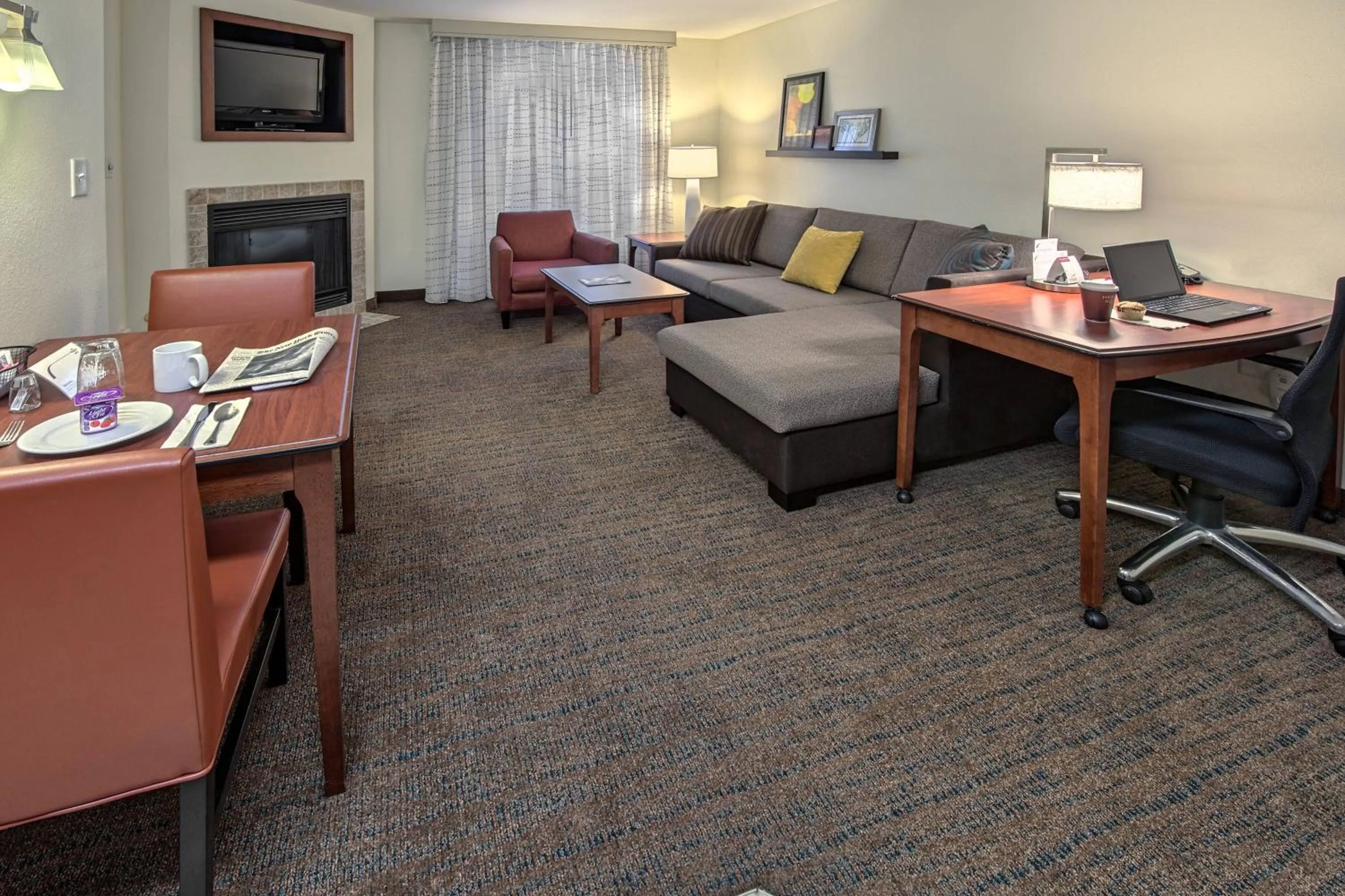 Living room in Residence Inn by Marriott Fayetteville Cross Creek