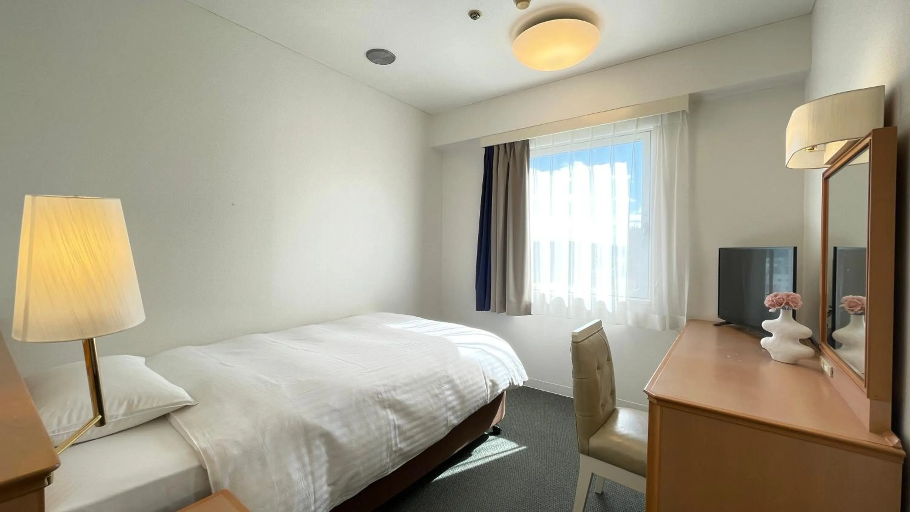 Bed in Grand Park Hotel Panex Iwaki