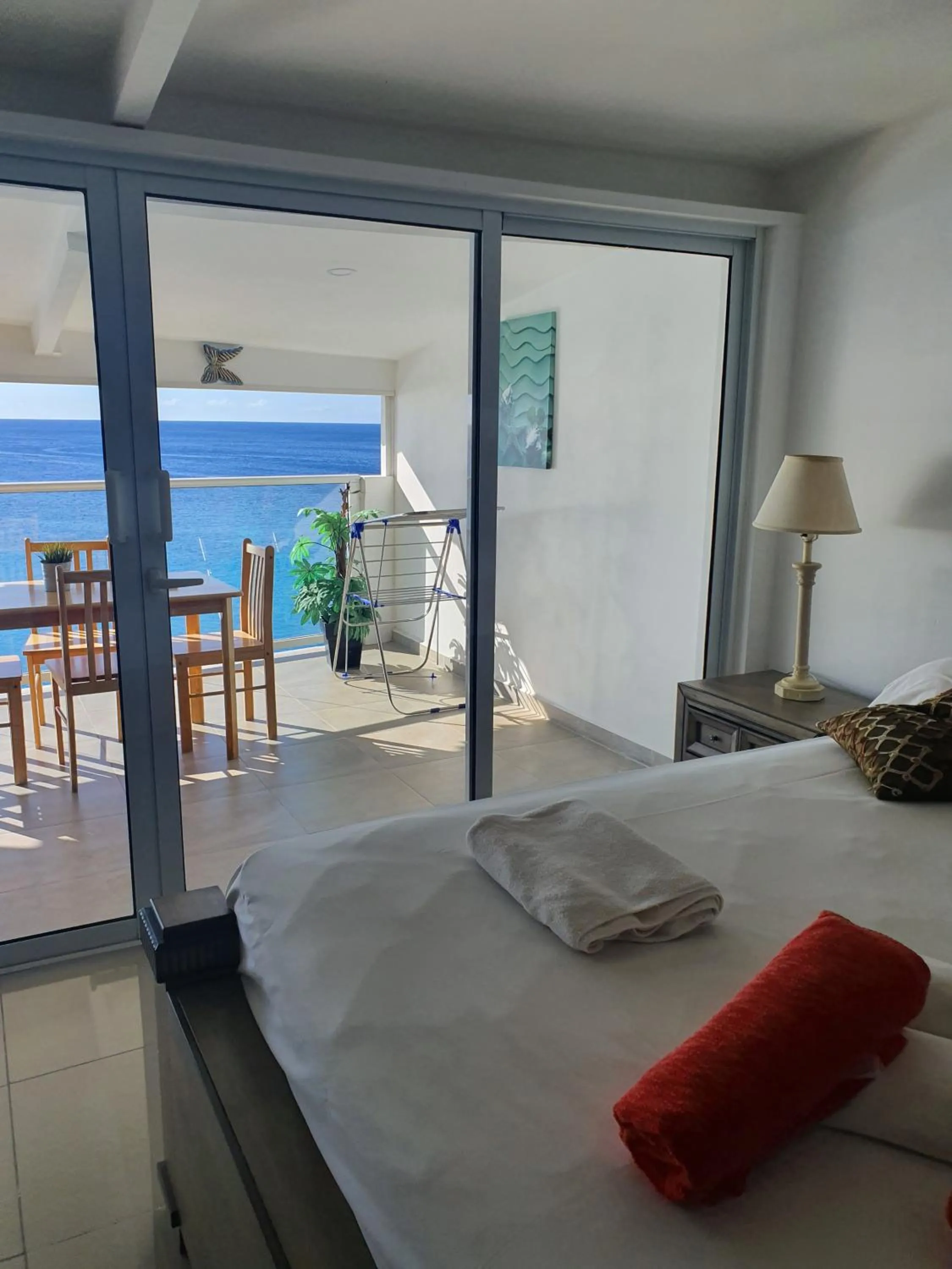 Sea view, Bed in Blue View Apartments