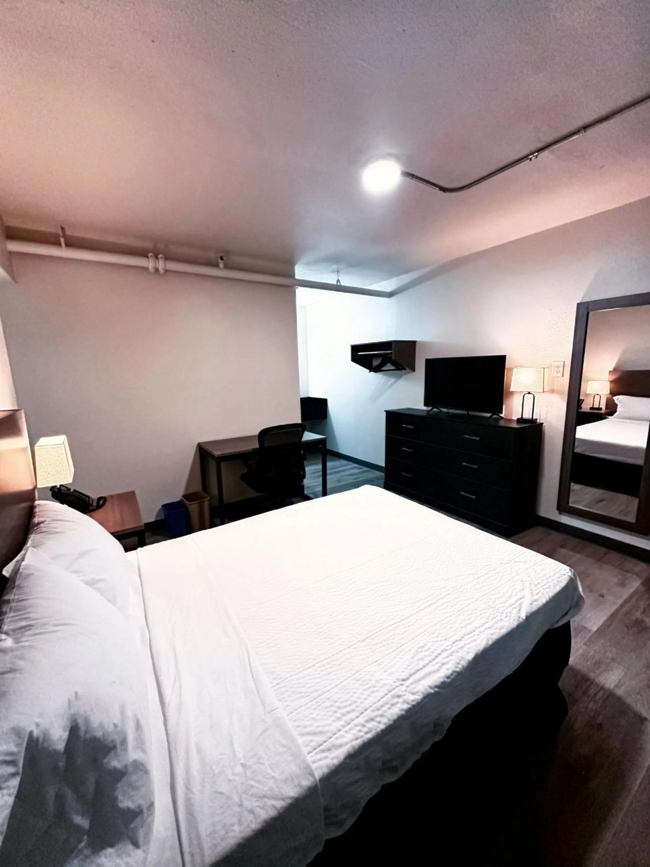 Bed in Studio City Suites, a Travelodge by Wyndham