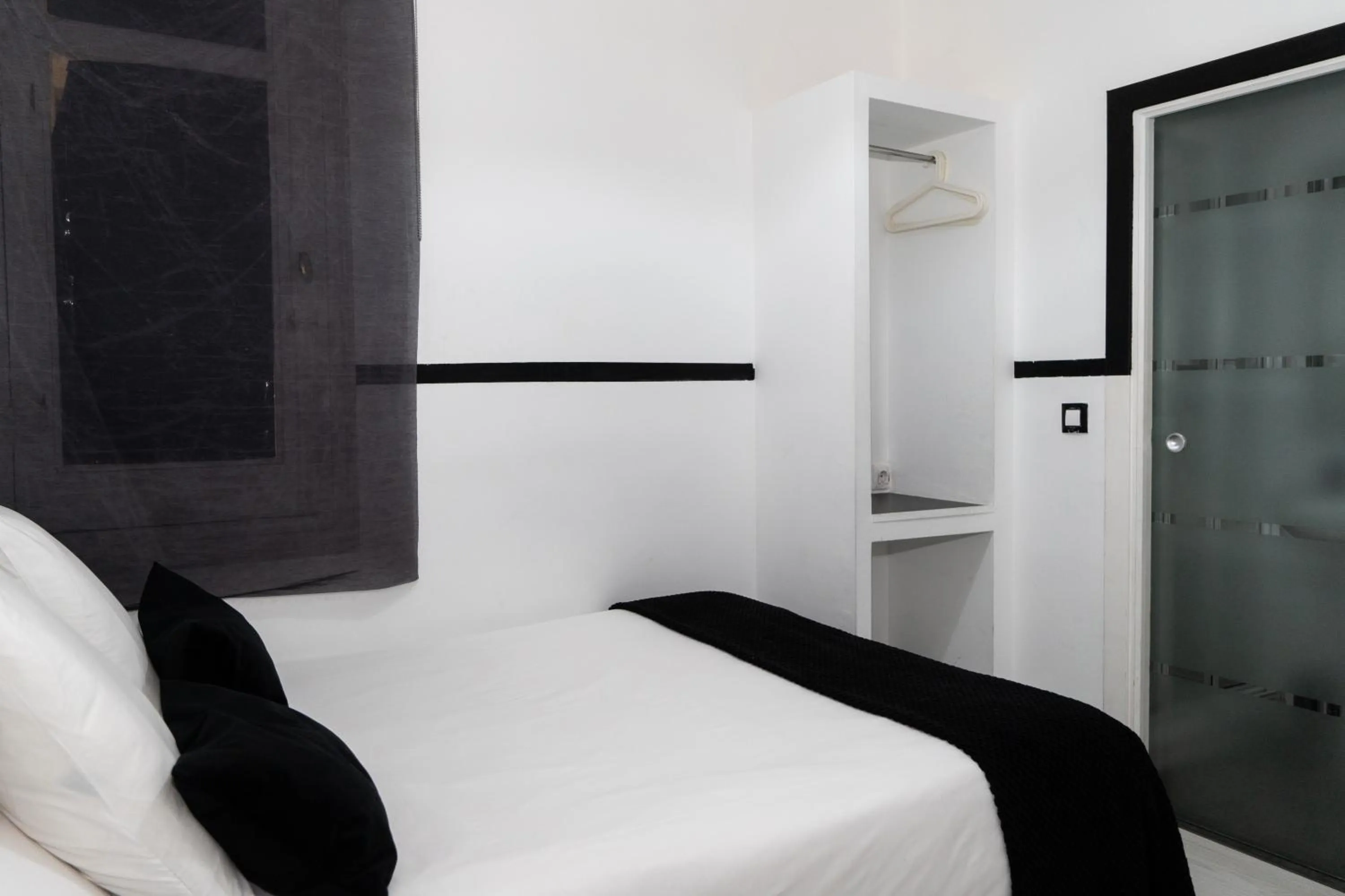 Bed in Gran Via 63 Rooms