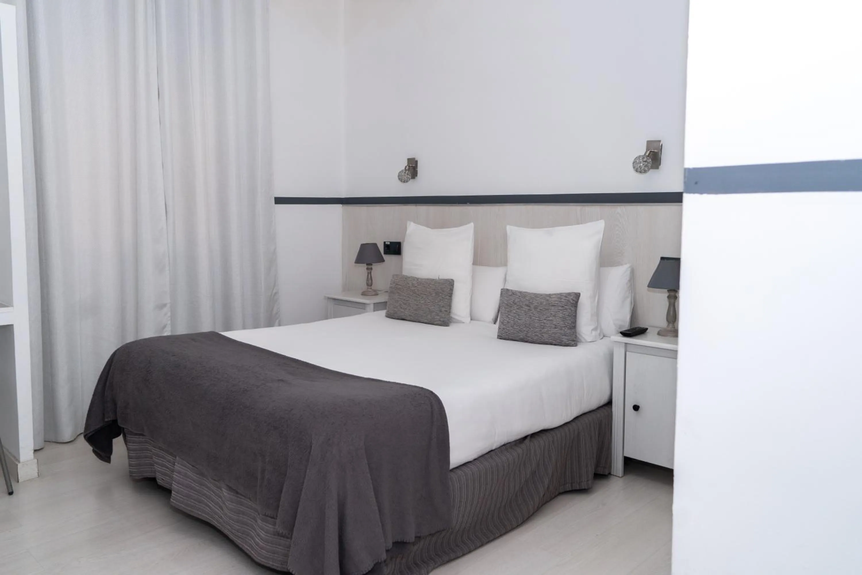 Bed in Gran Via 63 Rooms