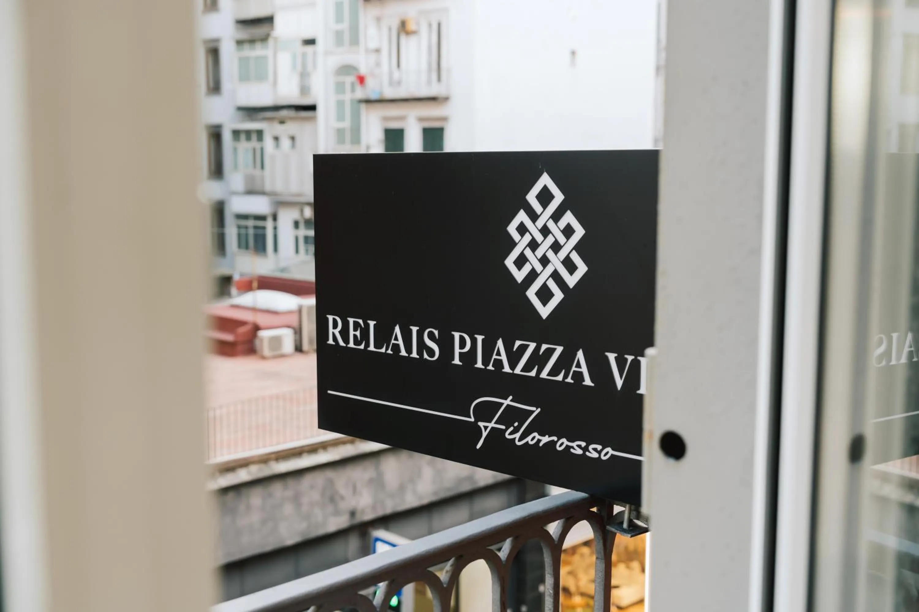 Property logo or sign in Relais Piazza Vittoria