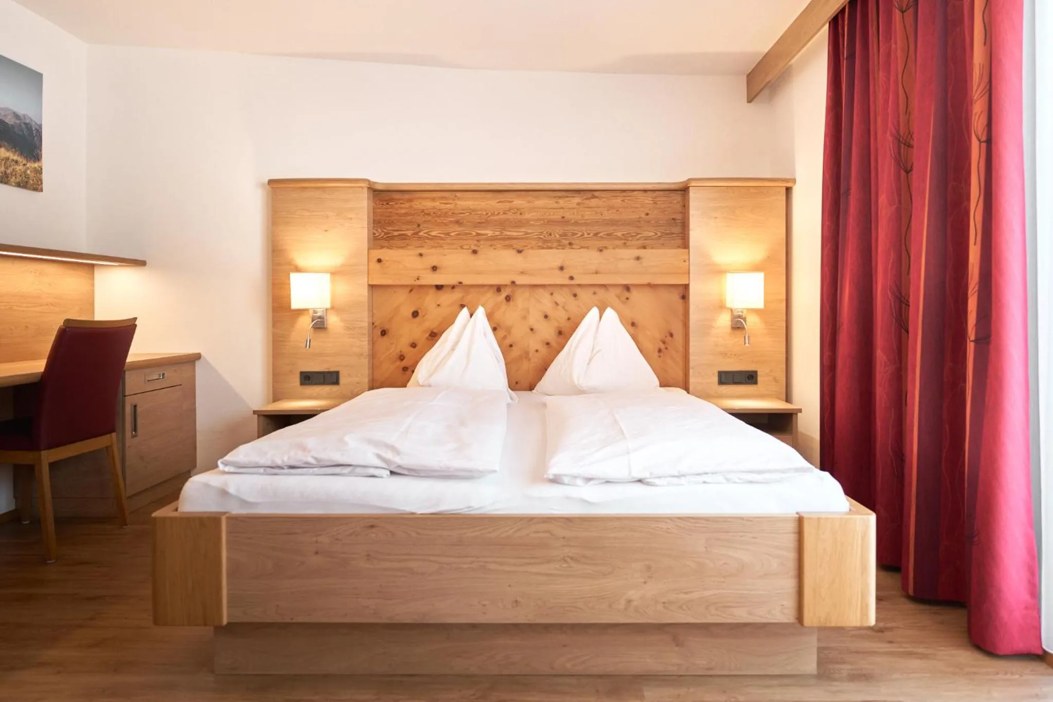 Bed in Pension Vier Jahreszeiten