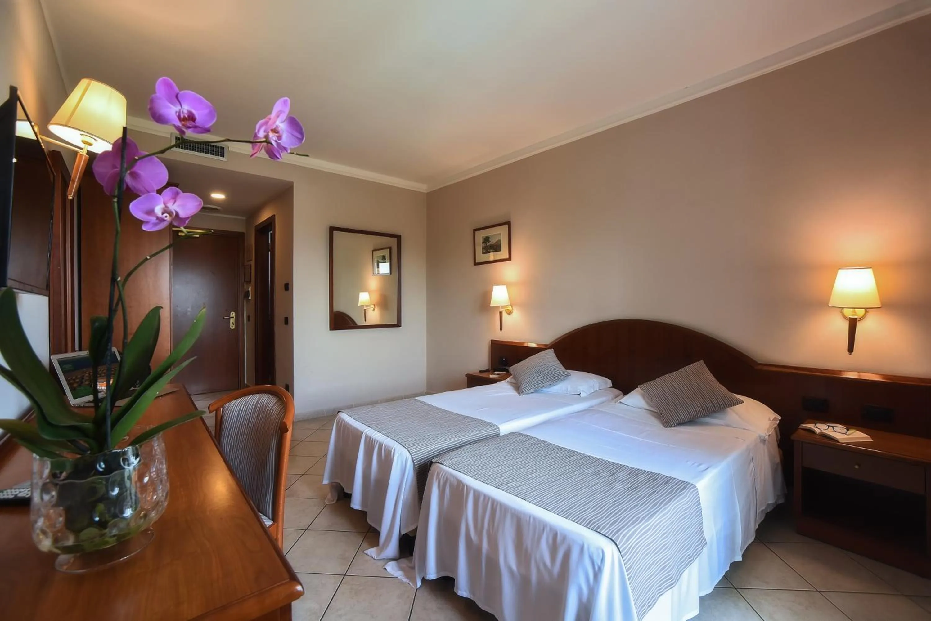 Bed in Hotel Le Palme