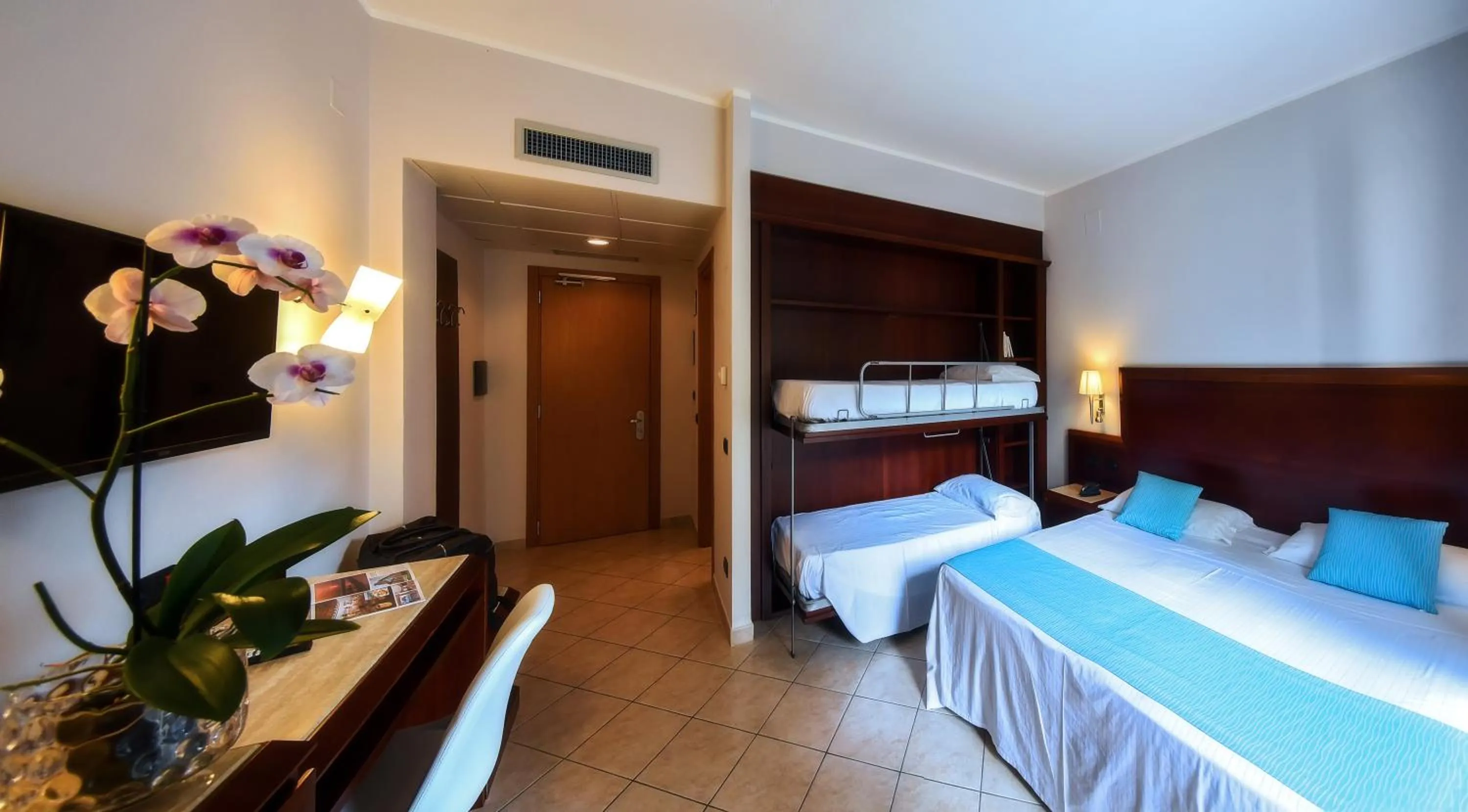 Bed in Hotel Le Palme