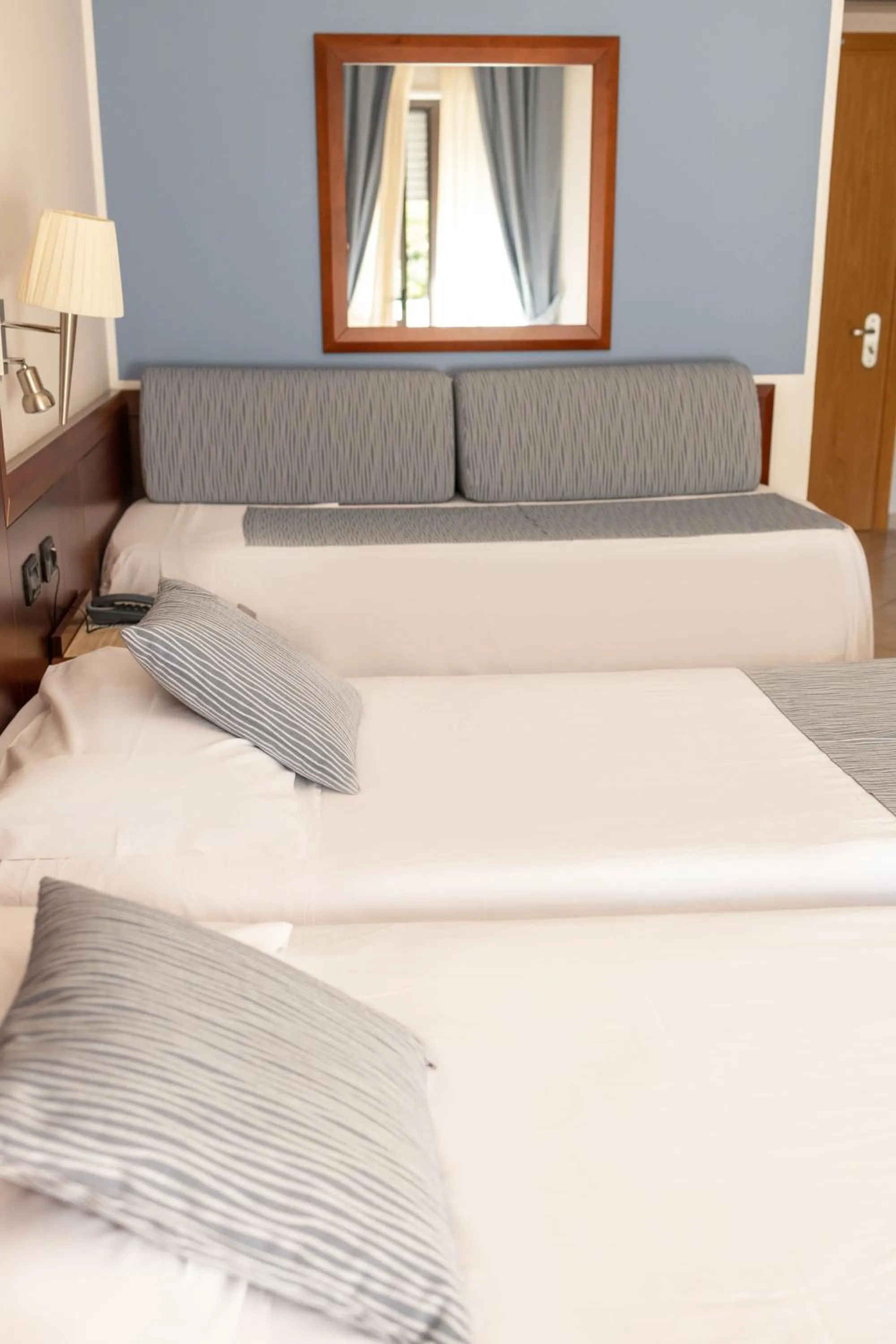 Bed in Hotel Le Palme