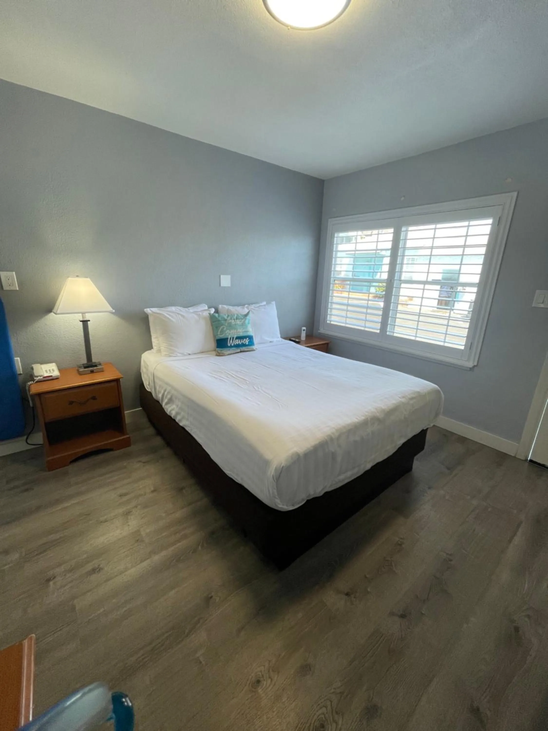 Bed in The Palomar Inn