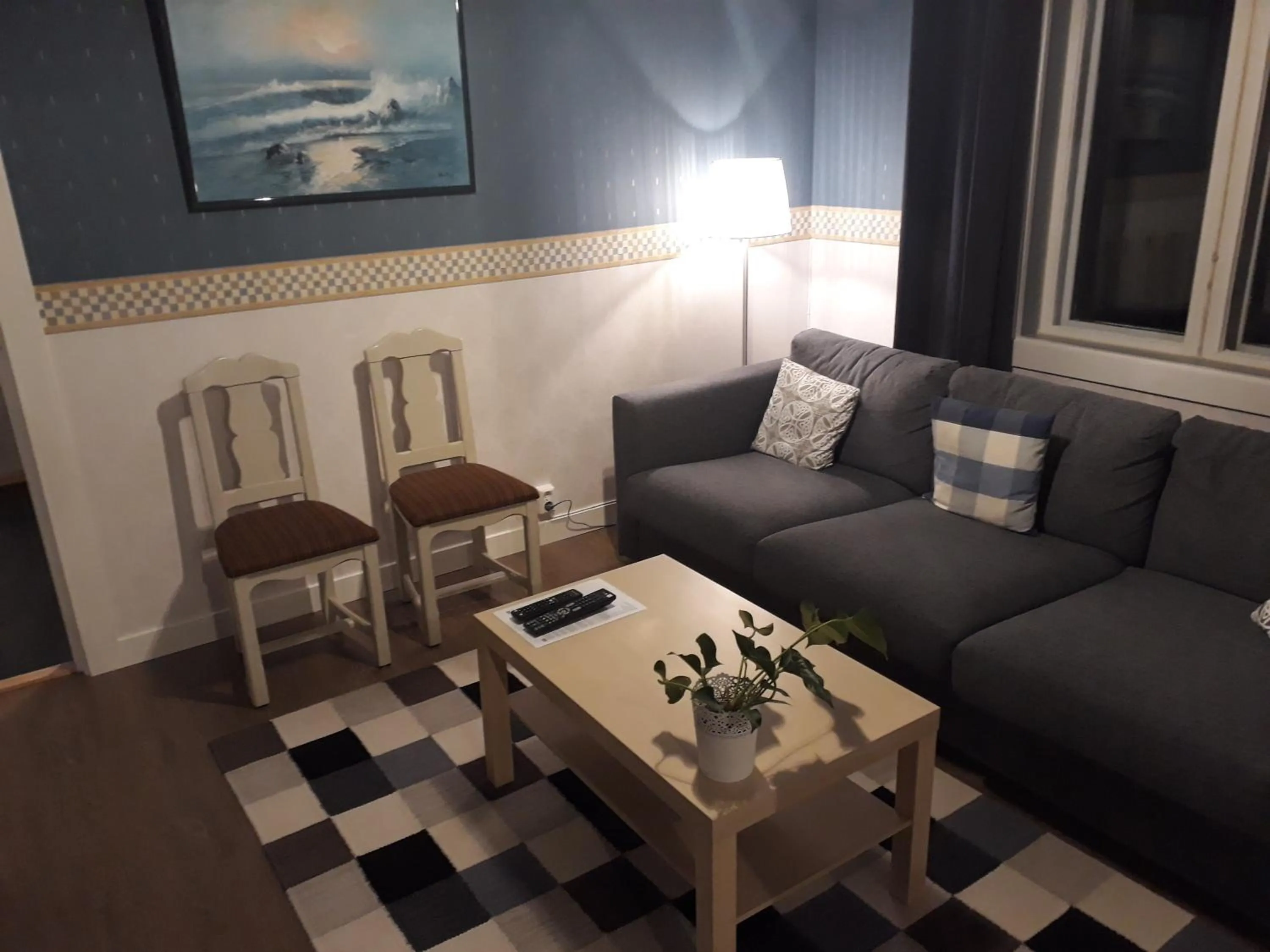 Communal lounge/ TV room in Geijersholms Herrgård