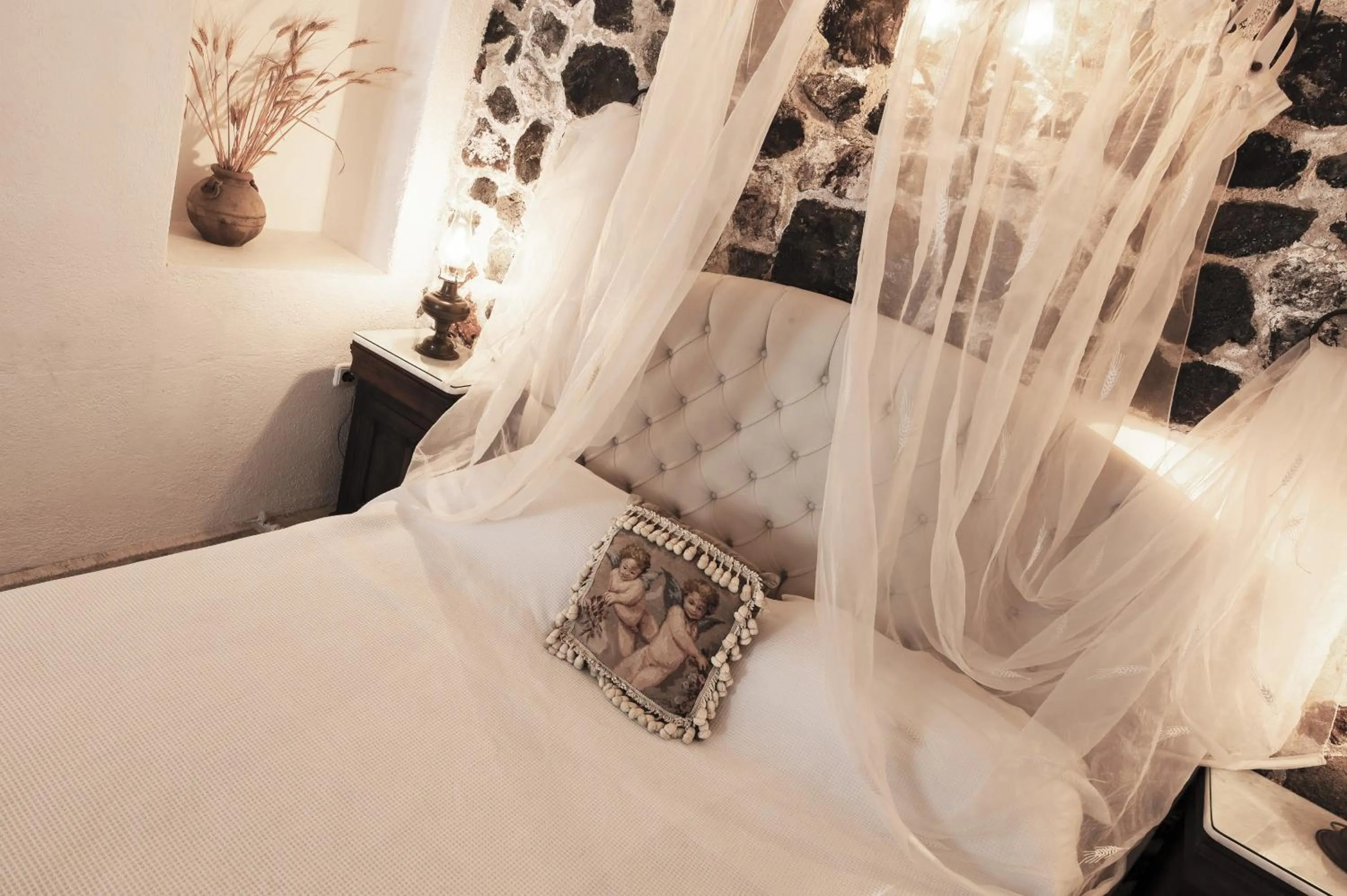 Bed in Alexander's Suites