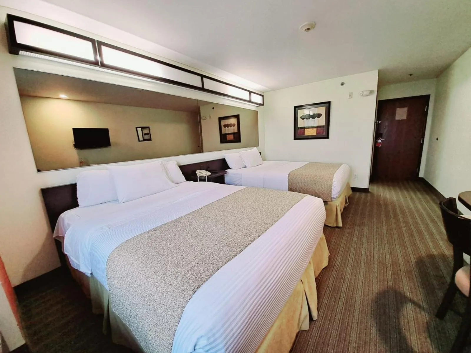 Bed in Microtel Inn and Suites by Wyndham Toluca