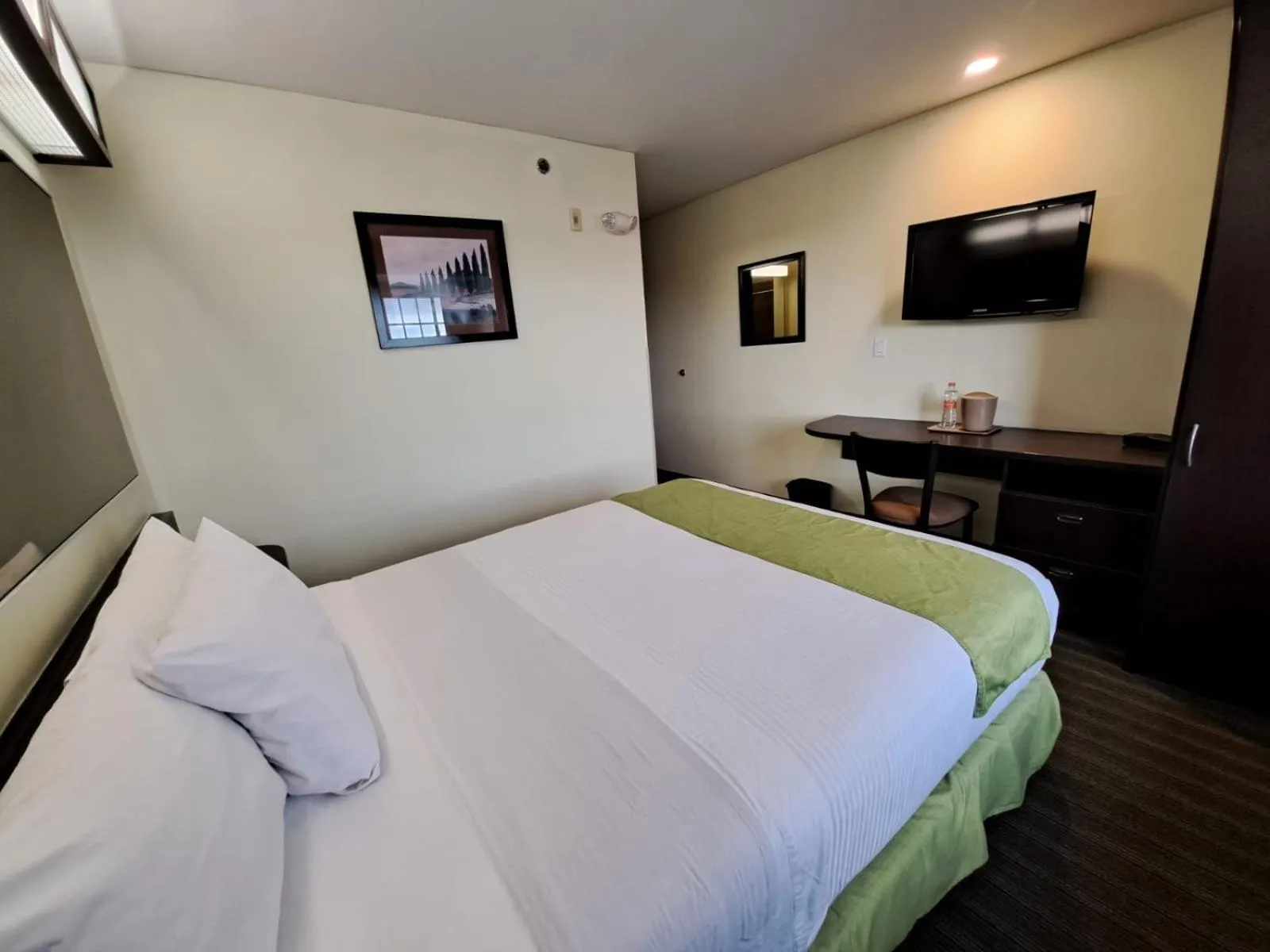 Bed in Microtel Inn and Suites by Wyndham Toluca