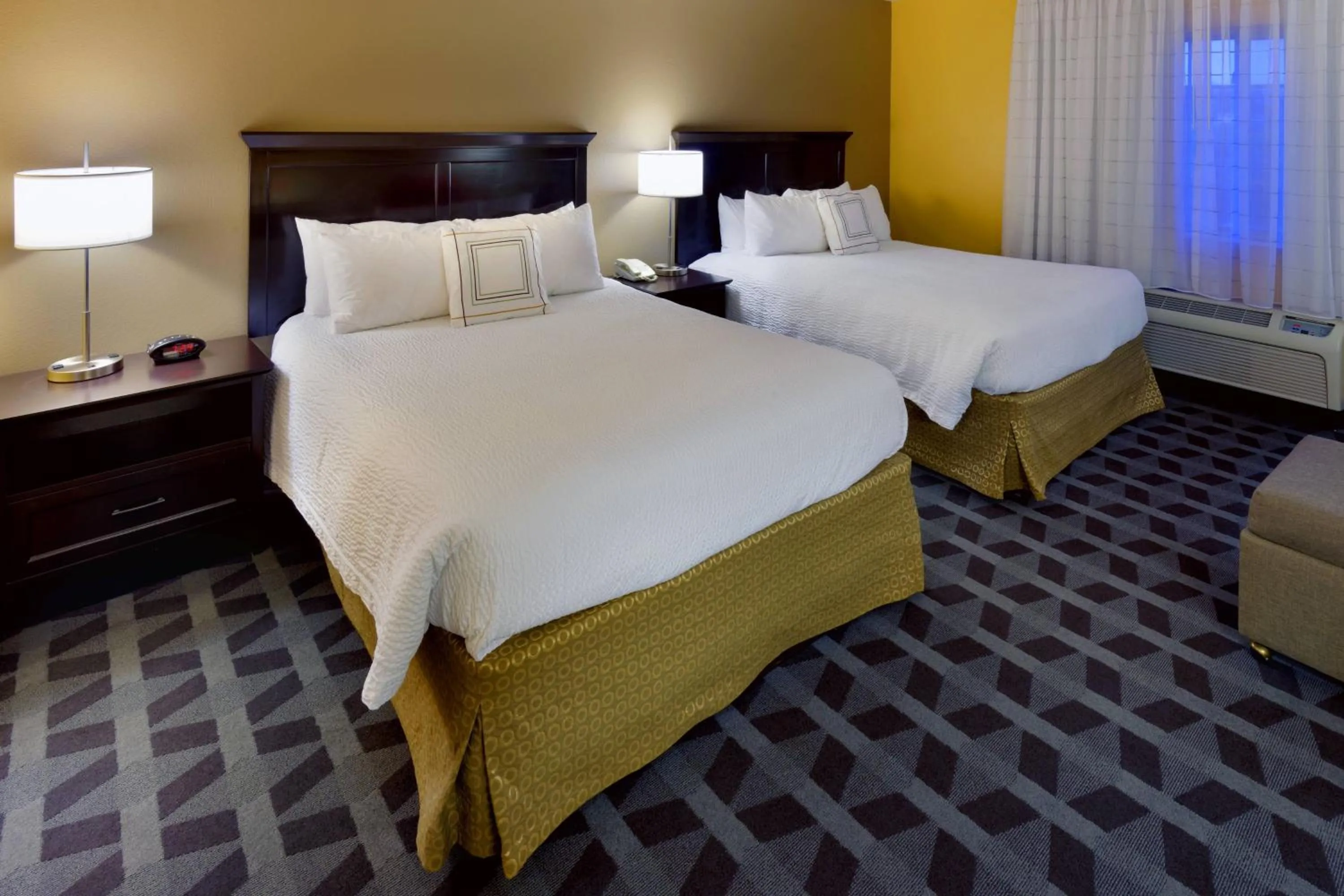 Photo of the whole room, Bed in TownePlace Suites Joplin