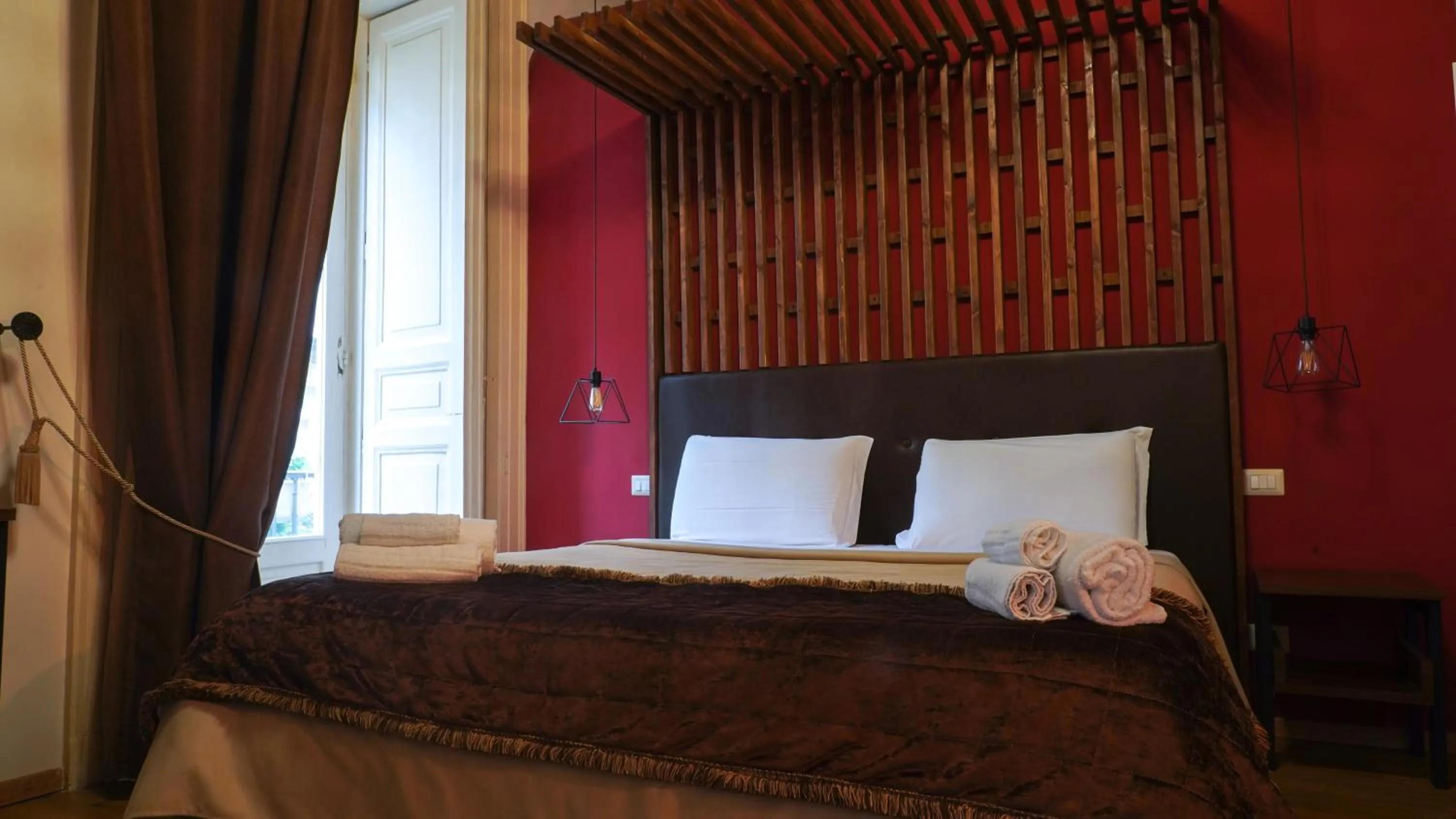 Bed in Duomo Luxury Suites