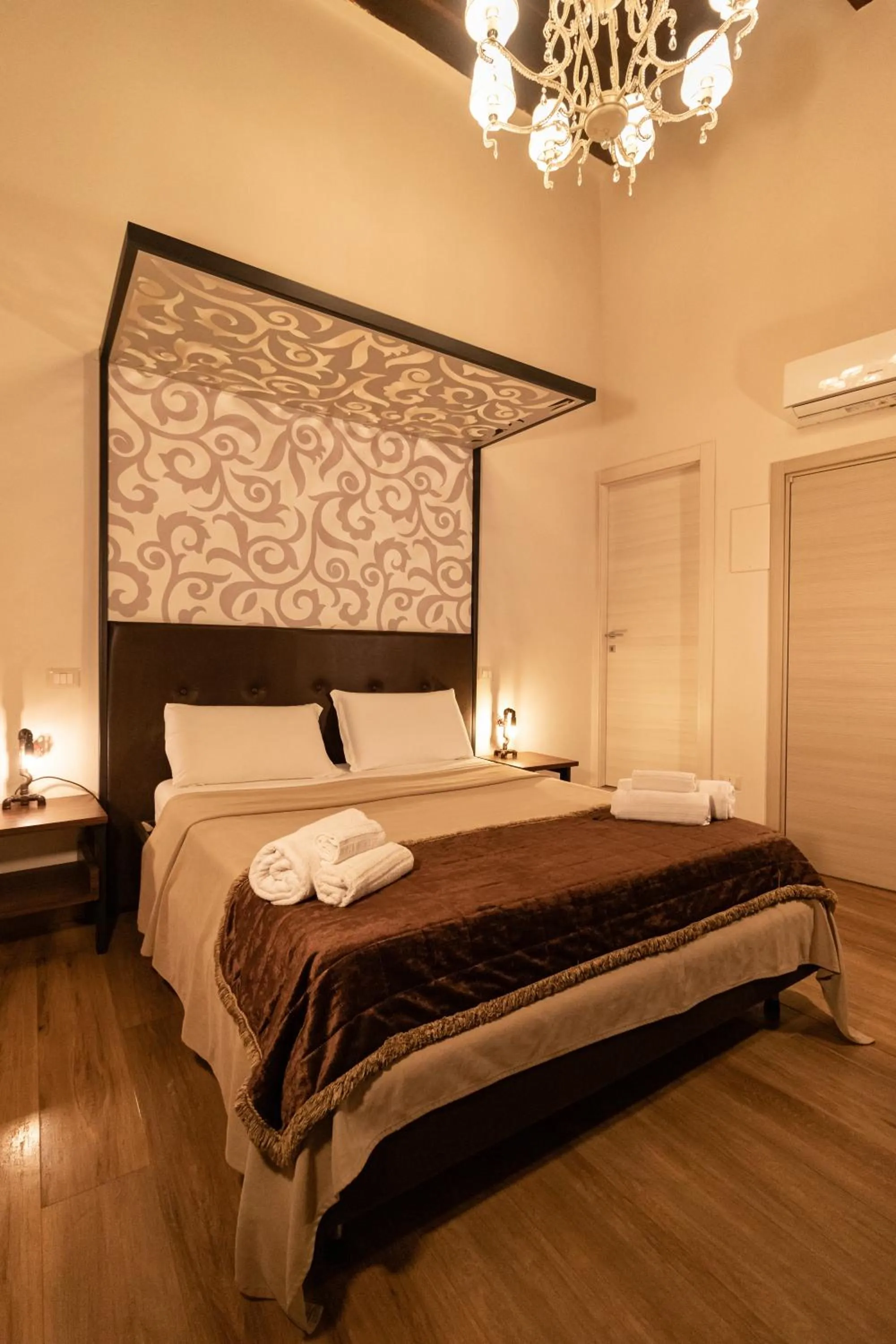 Bed in Duomo Luxury Suites