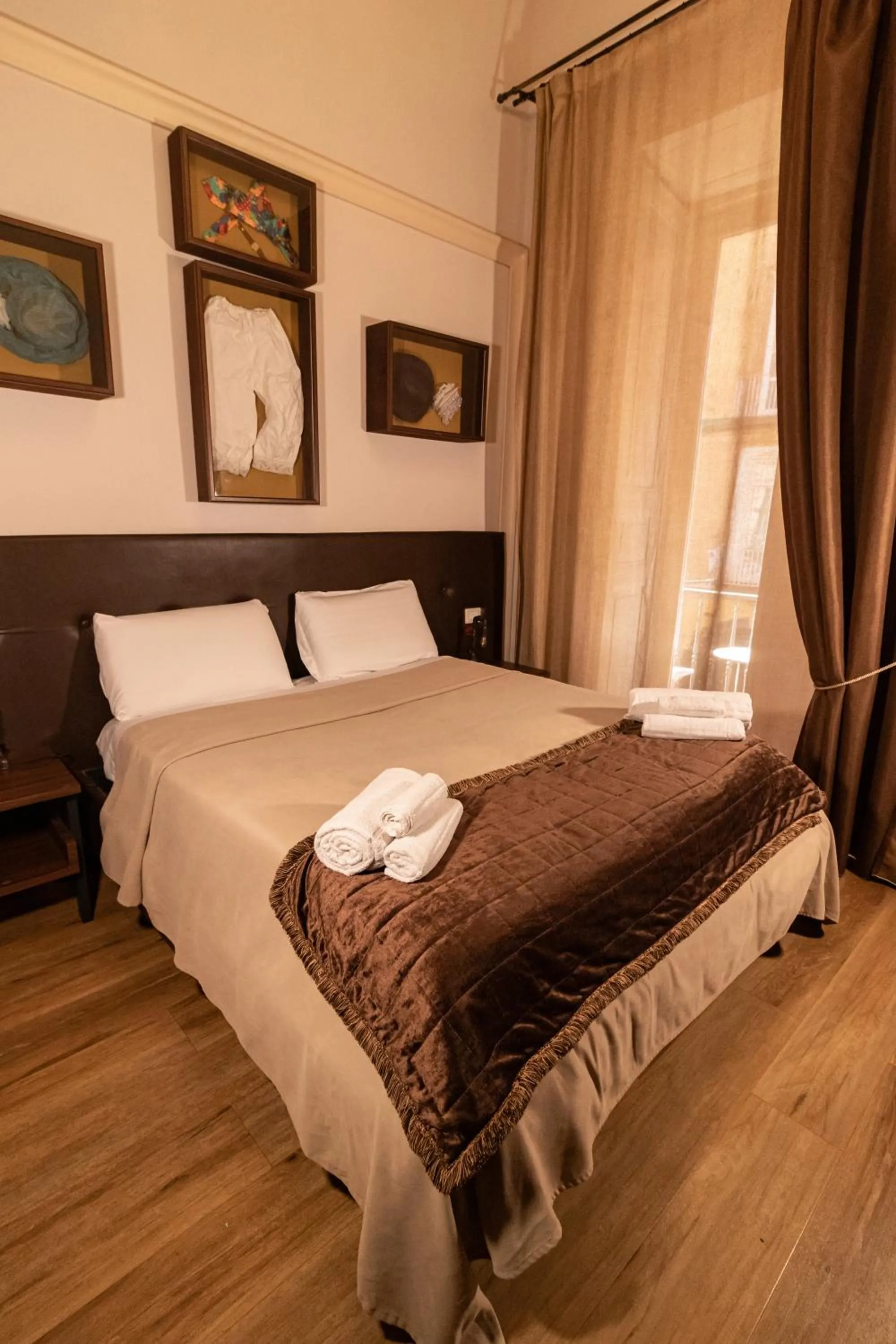 Bed in Duomo Luxury Suites