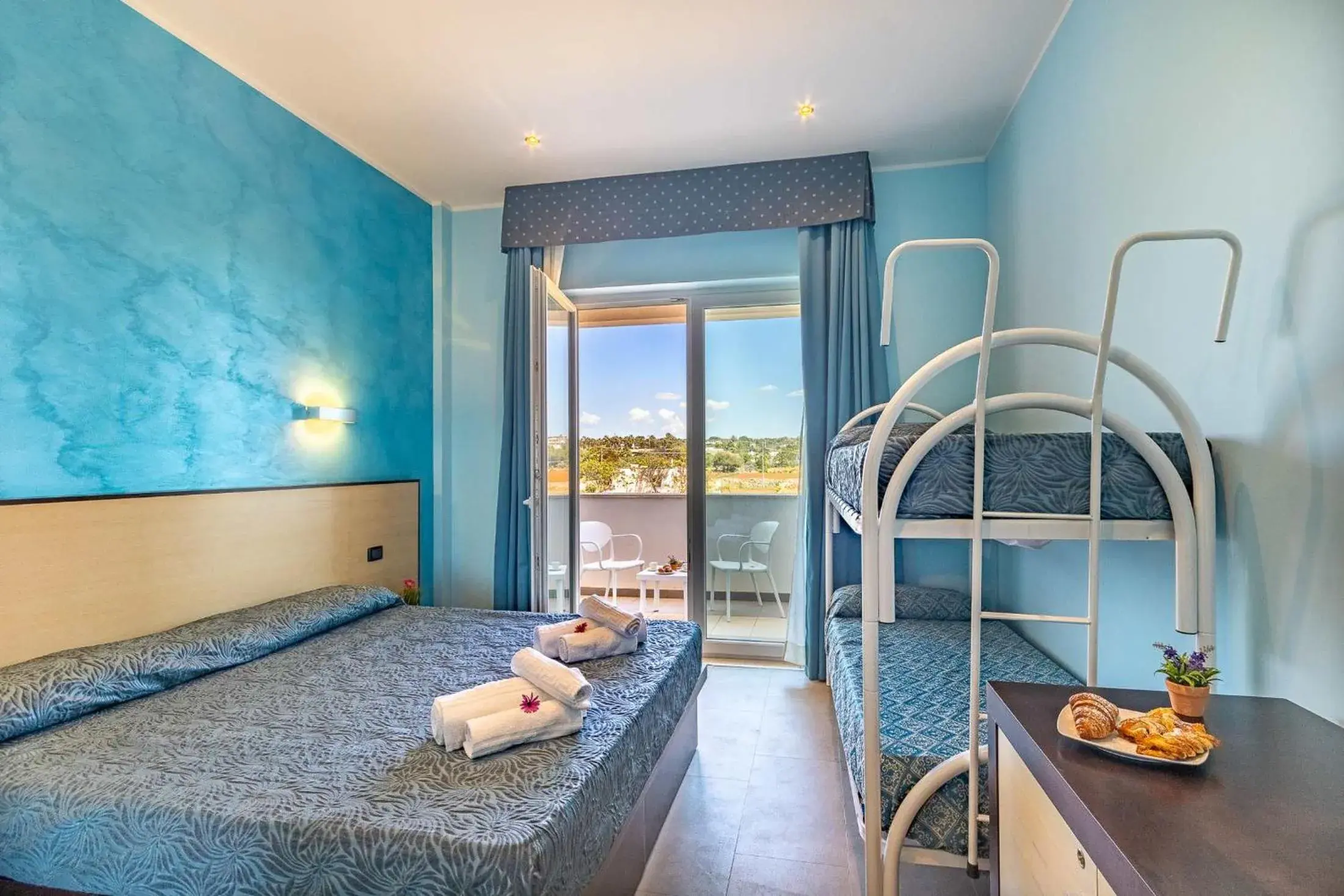 Quadruple Room with Balcony and Country View in Jonico Hotel Quadruple Room with Balcony and Country View in Jonico Hotel