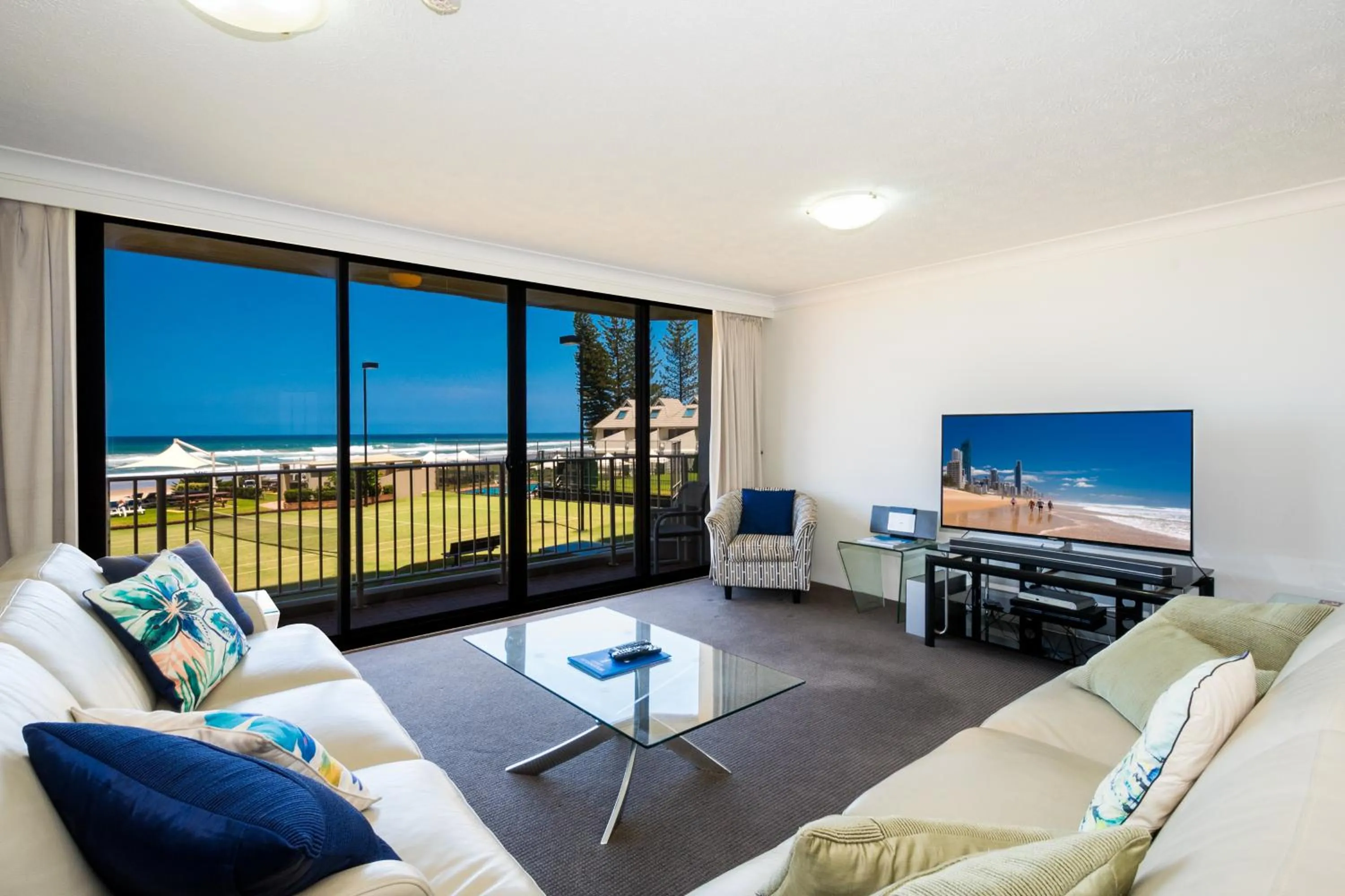 Living room in Breakers North Absolute Beachfront Apartments - Official