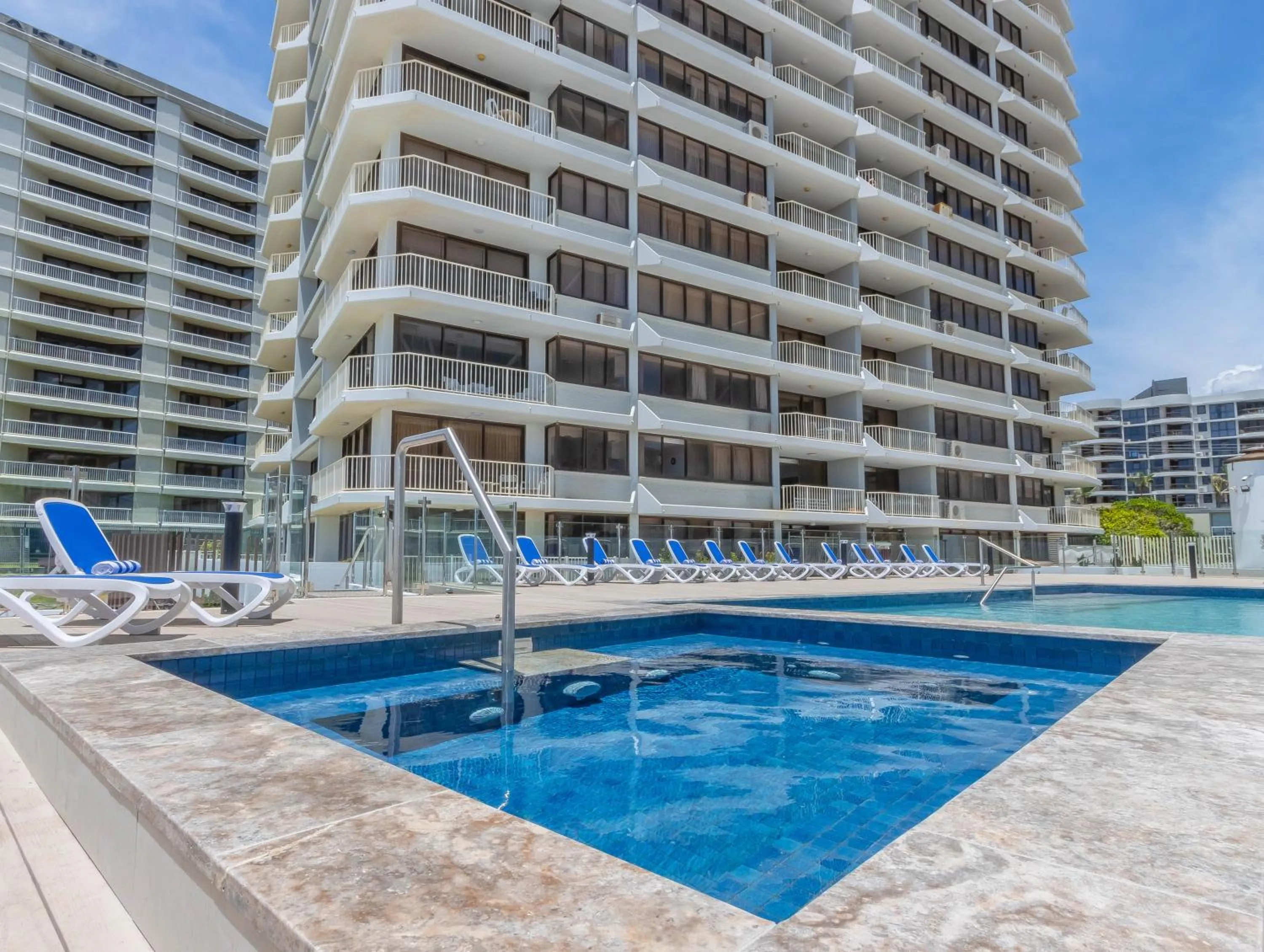 Swimming pool in Breakers North Absolute Beachfront Apartments - Official