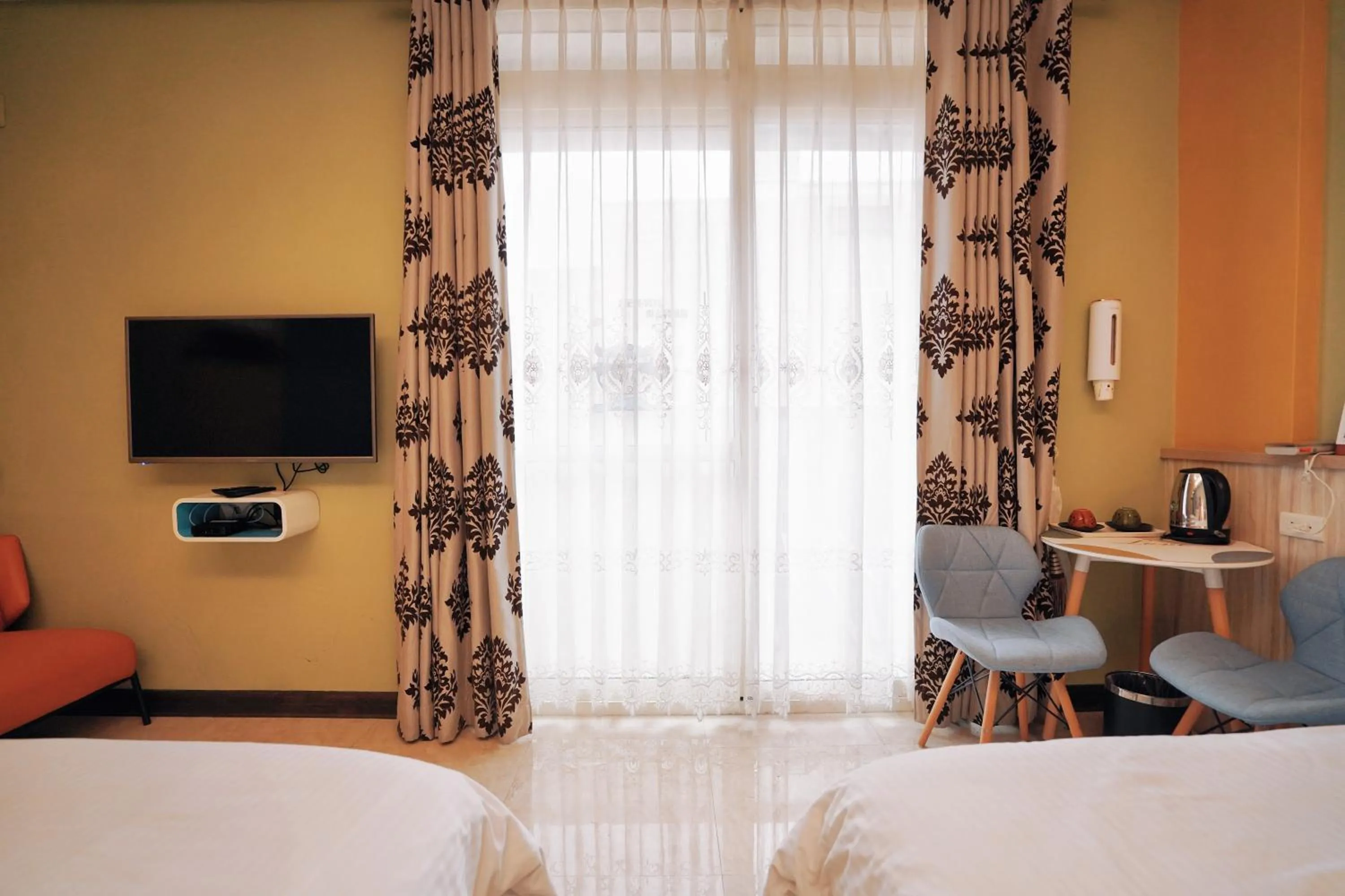 Bed in 夏之戀民宿 可包棟 近金城市區