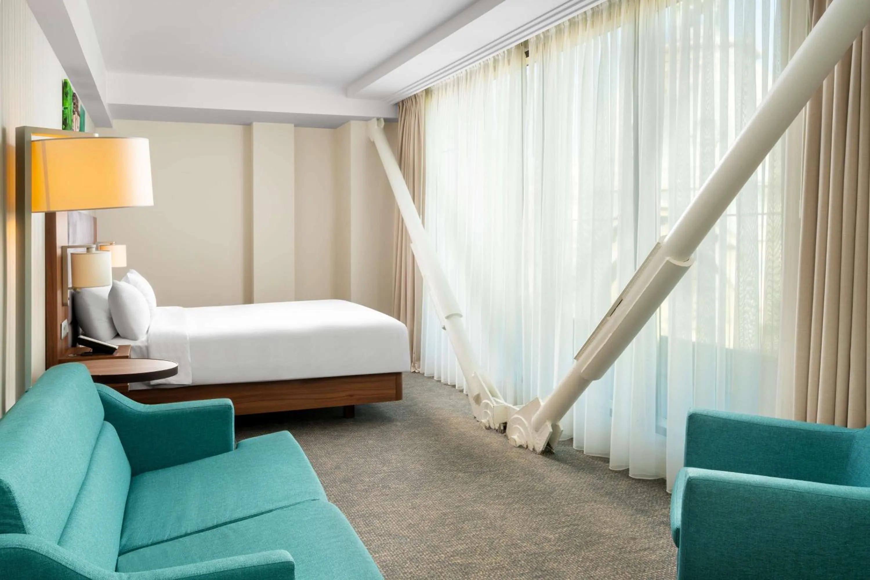 Living room, Bed in Hilton Garden Inn Bucharest Old Town