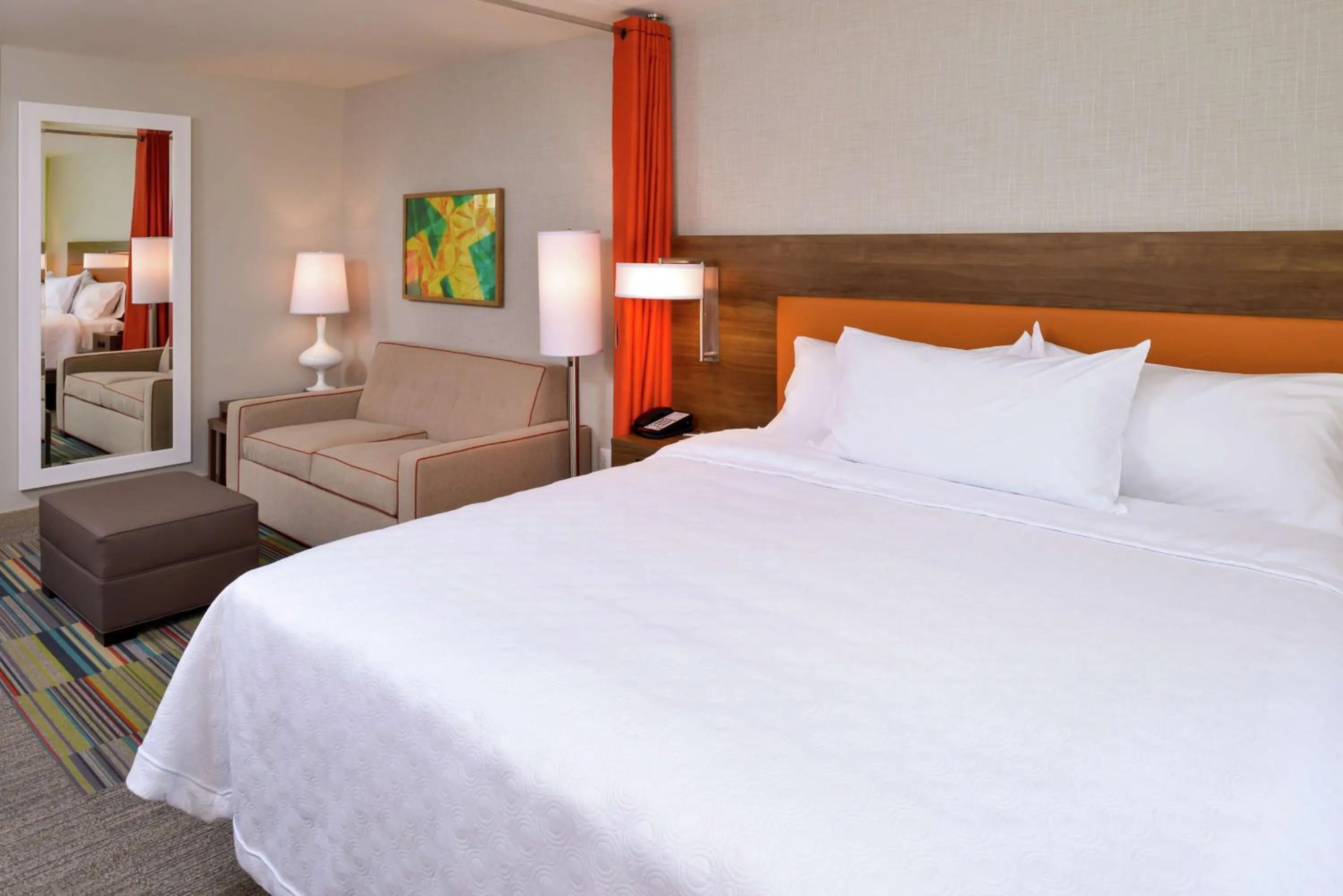 Living room, Bed in Home2 Suites By Hilton Merrillville