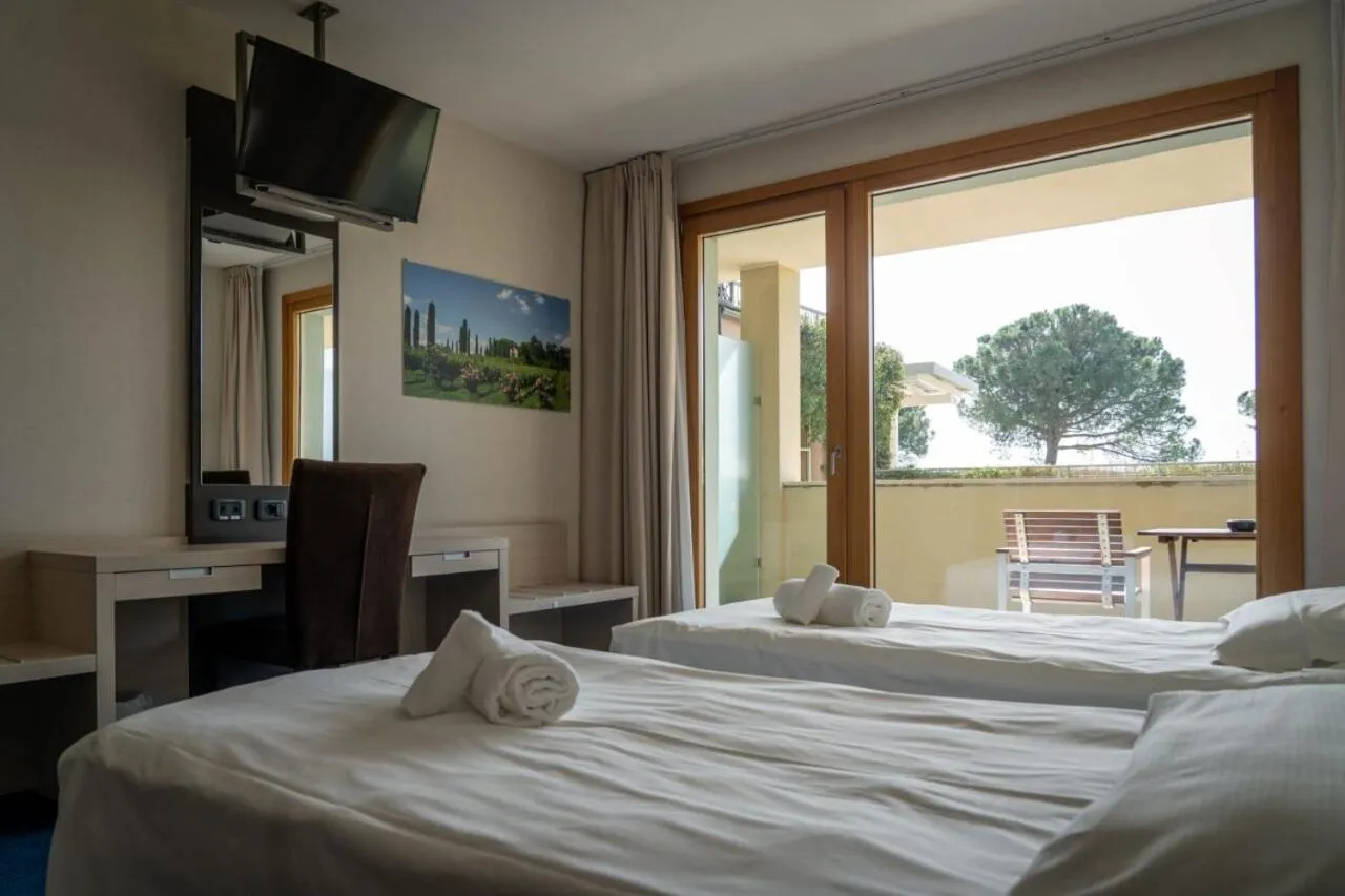 Bed in Cocca Hotel Royal Thai Spa