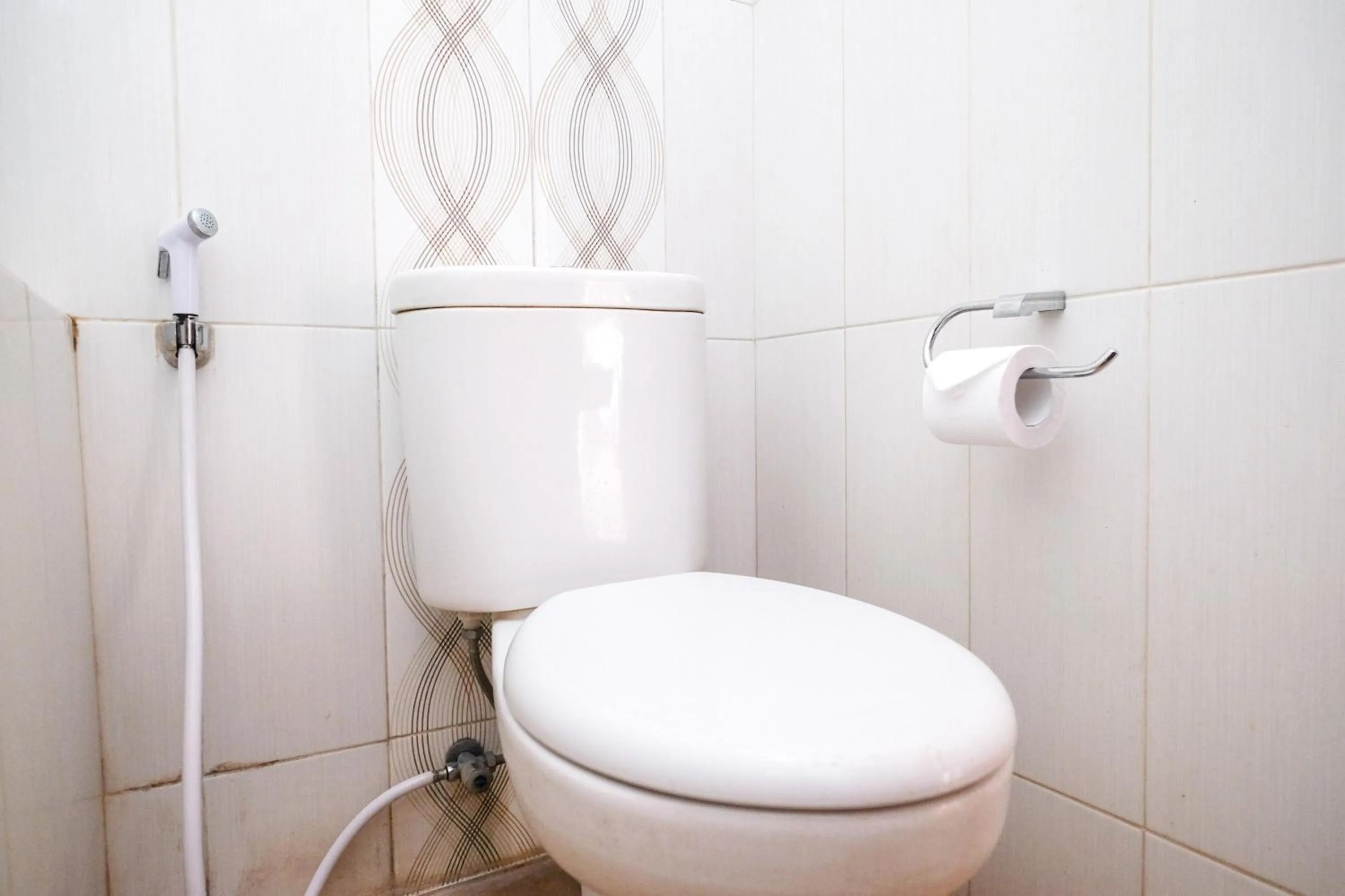 Bathroom in Urbanview Omah Eka Santi by RedDoorz